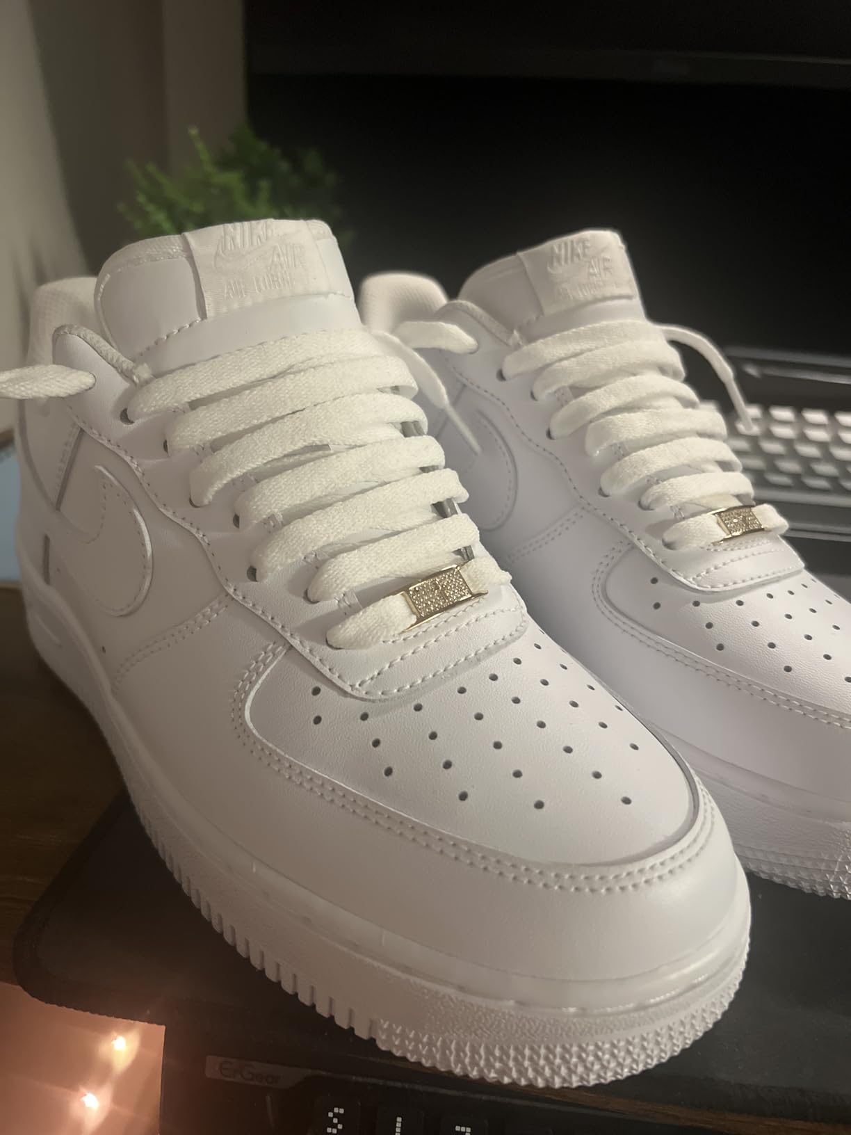 Nike Air Force 1 toe box and perforated leather details close-up view
