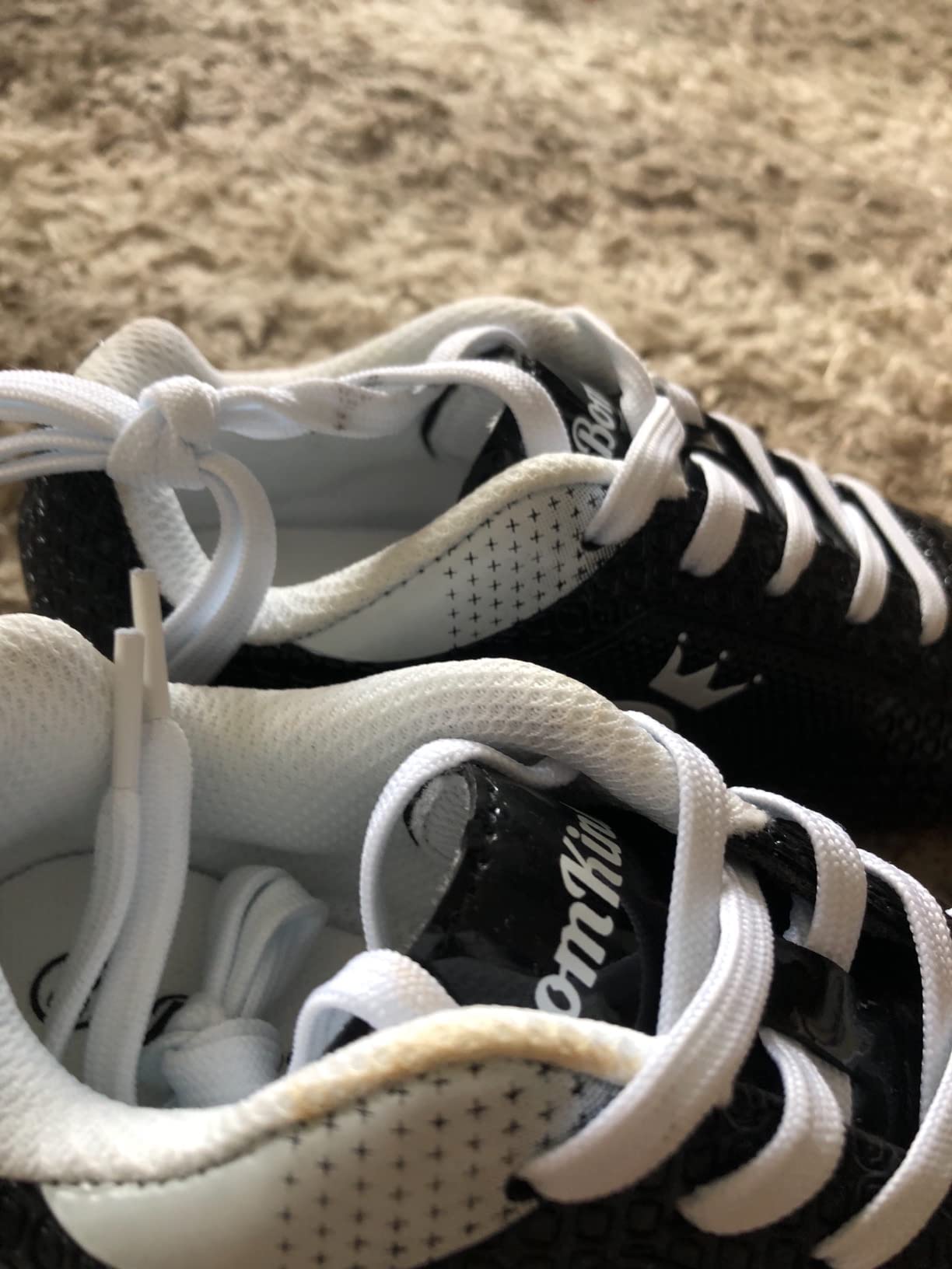 Close-up of BomKinta soccer cleat showing wear patterns after extended use