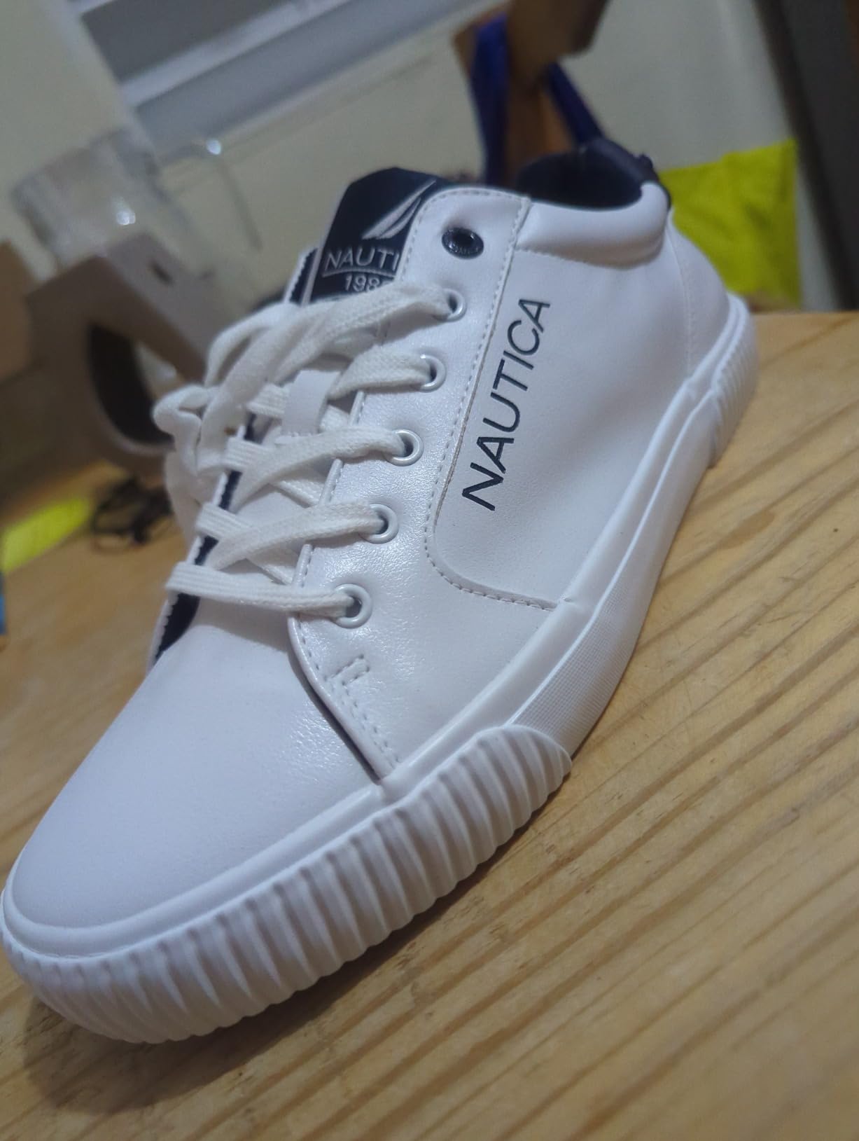 Lifestyle shot of Nautica shoes during casual wear showing versatility and style