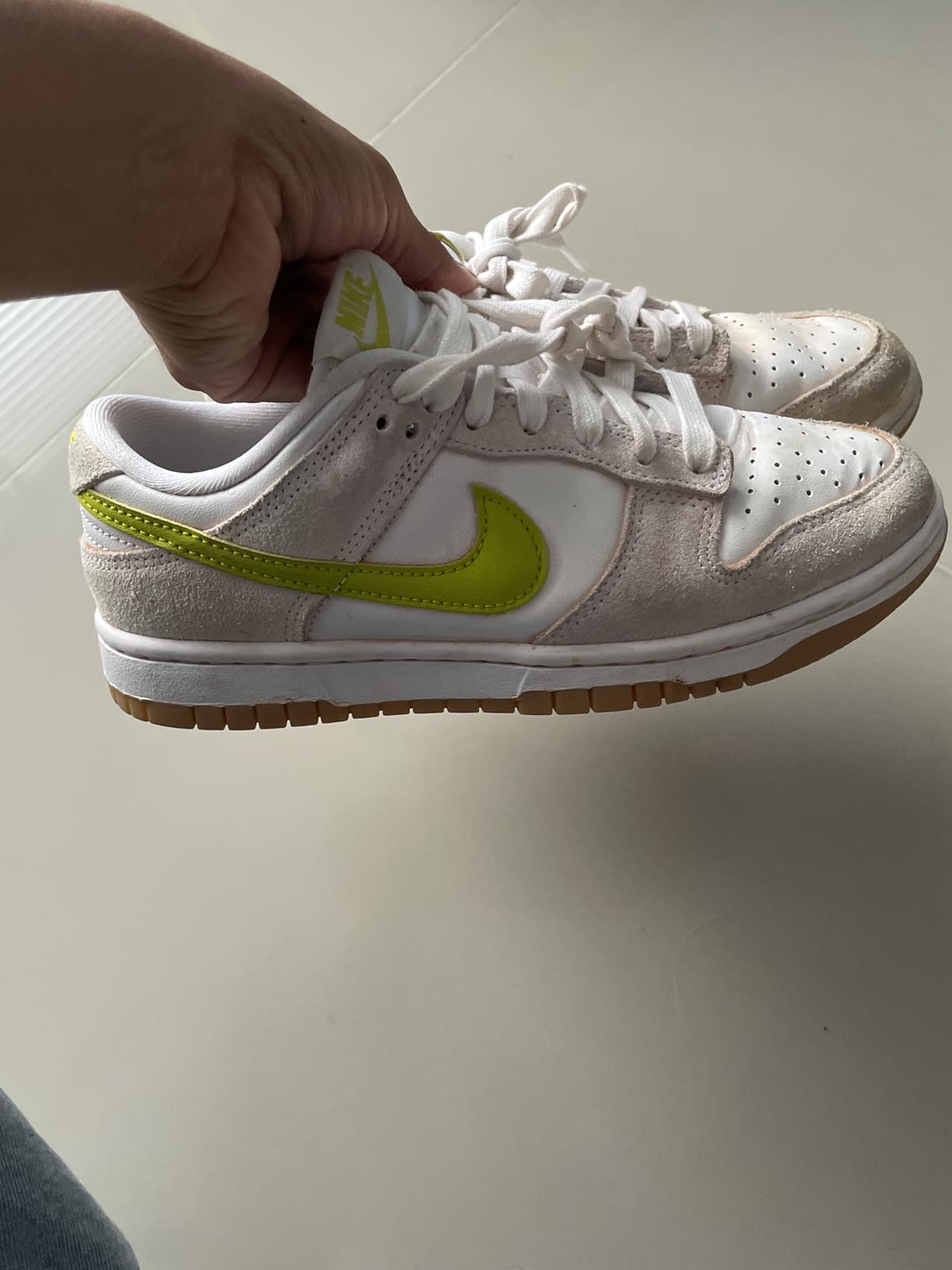 Nike Dunk Low detail shot showing leather upper construction and lacing system