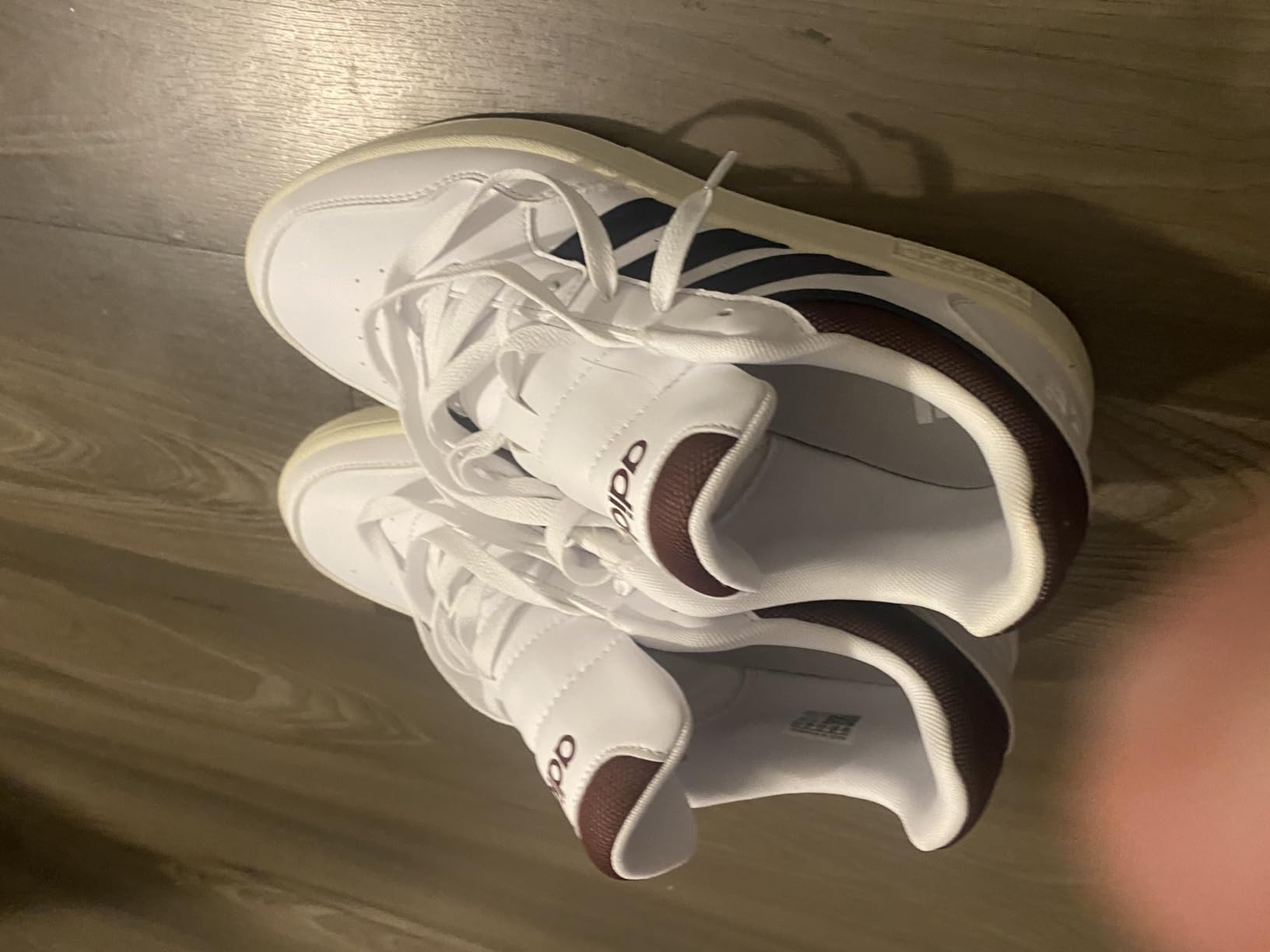 Comparison image showing Adidas Hoops 3.0 basketball shoe design details and brand claims verification