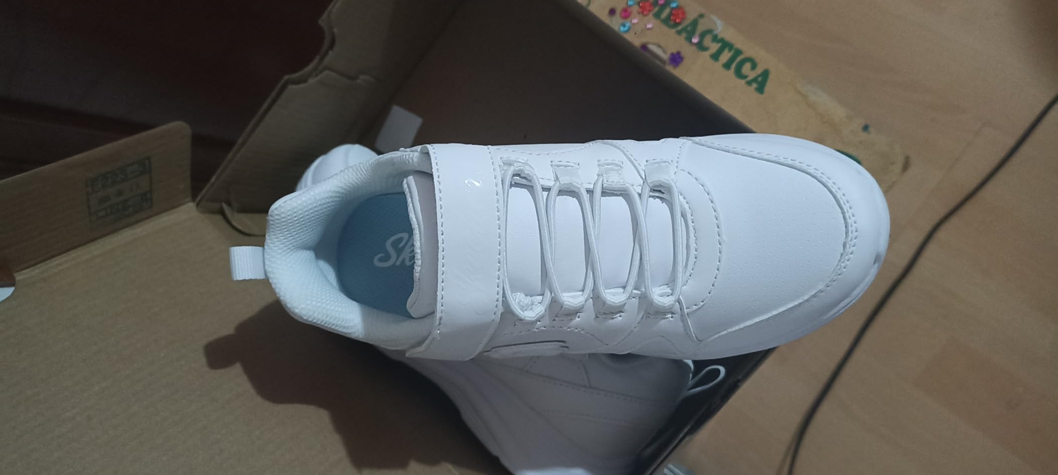 Bottom sole view of Skechers Girls Glimmer Kicks showing tread pattern and lightweight construction