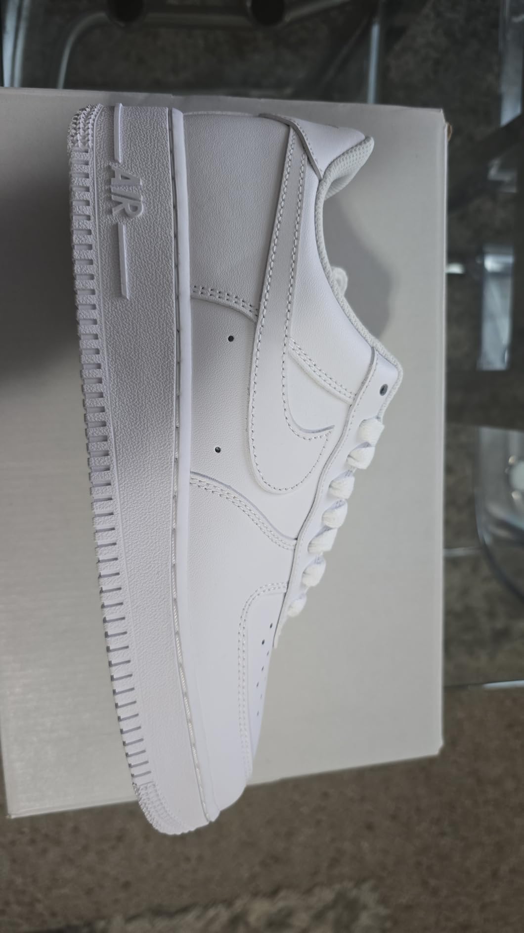 Nike Air Force 1 side profile showing the iconic basketball shoe silhouette and ankle support