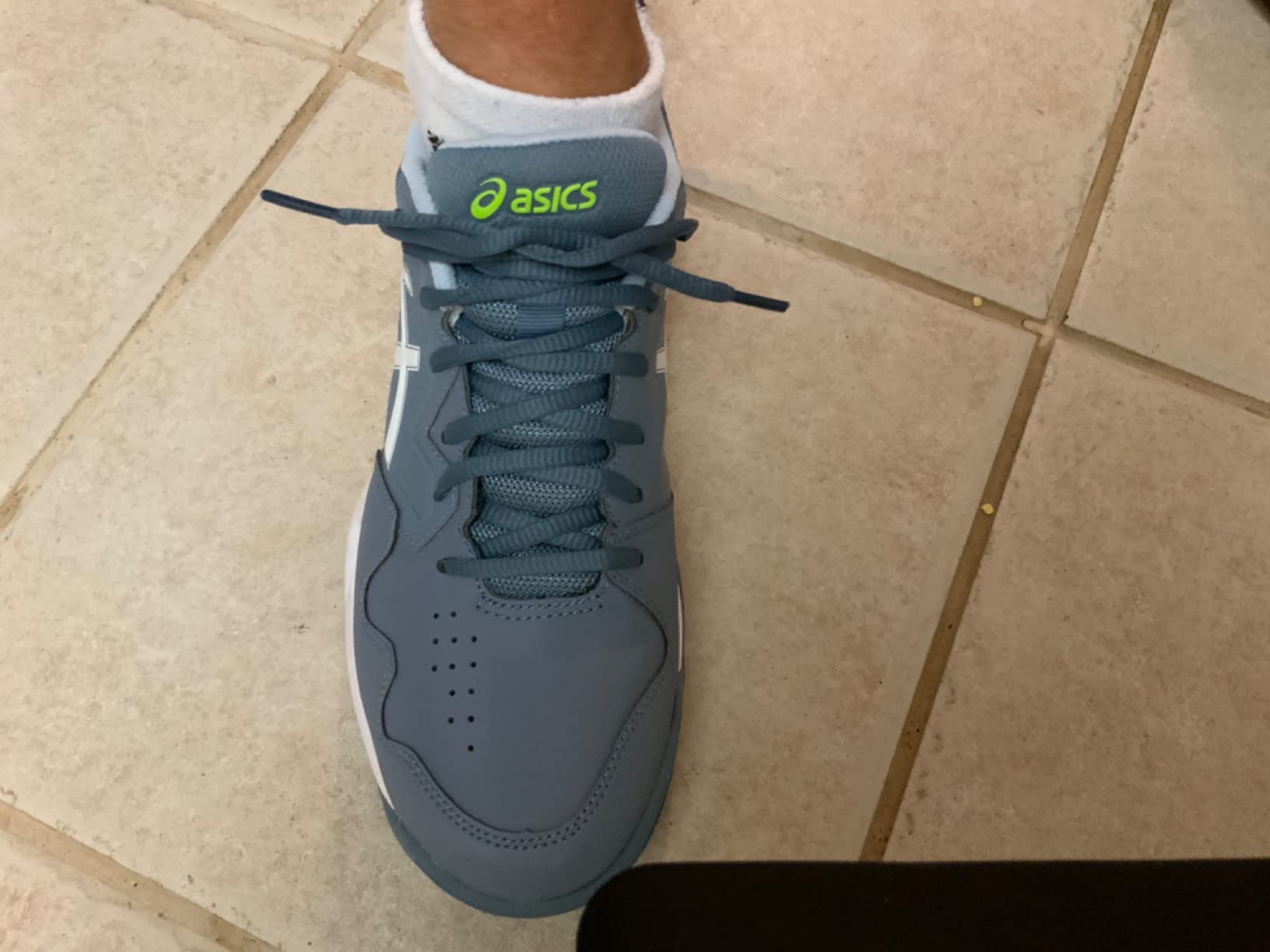 ASICS Gel-Dedicate 7 tennis shoes showing lacing system and overall design
