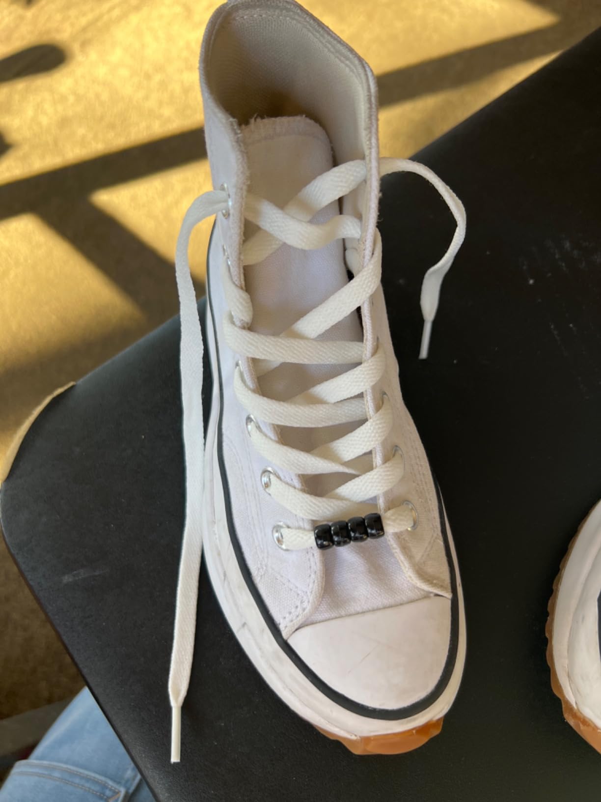 Close-up view of ZHENTOR flat shoelaces showing dense polyester weave texture