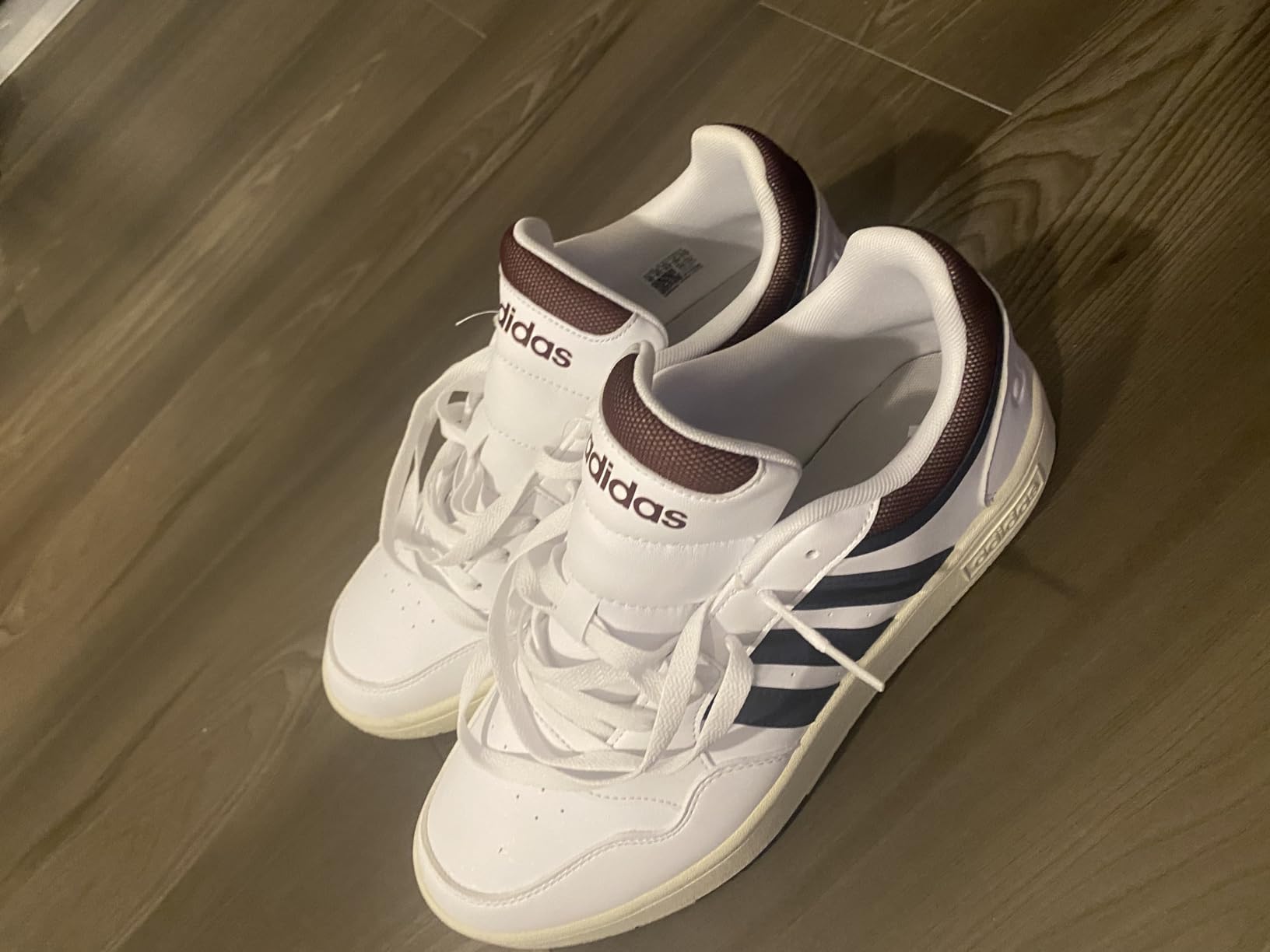 Full outfit styling photo showing Adidas Hoops 3.0 worn with casual daily wear for versatility demonstration