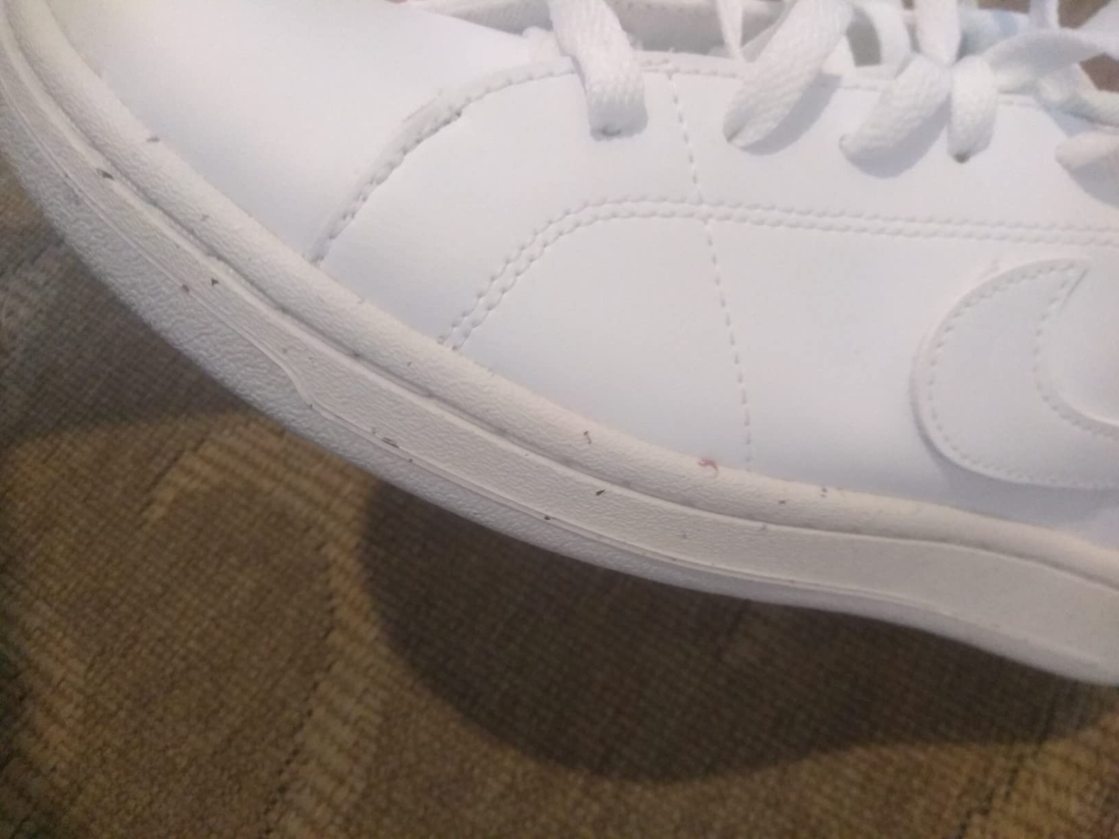 Nike Court Vision Low showing wear patterns after weeks of testing on multiple court surfaces