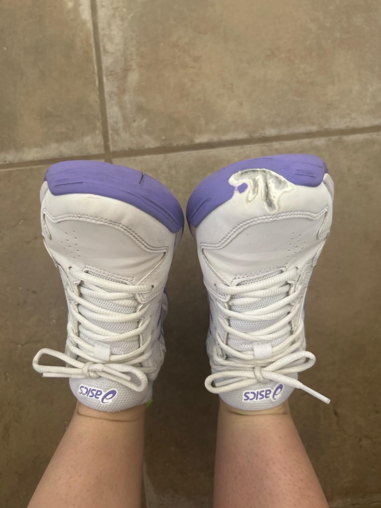 ASICS Gel-Dedicate 7 showing toe durability issues with visible wear after court usage