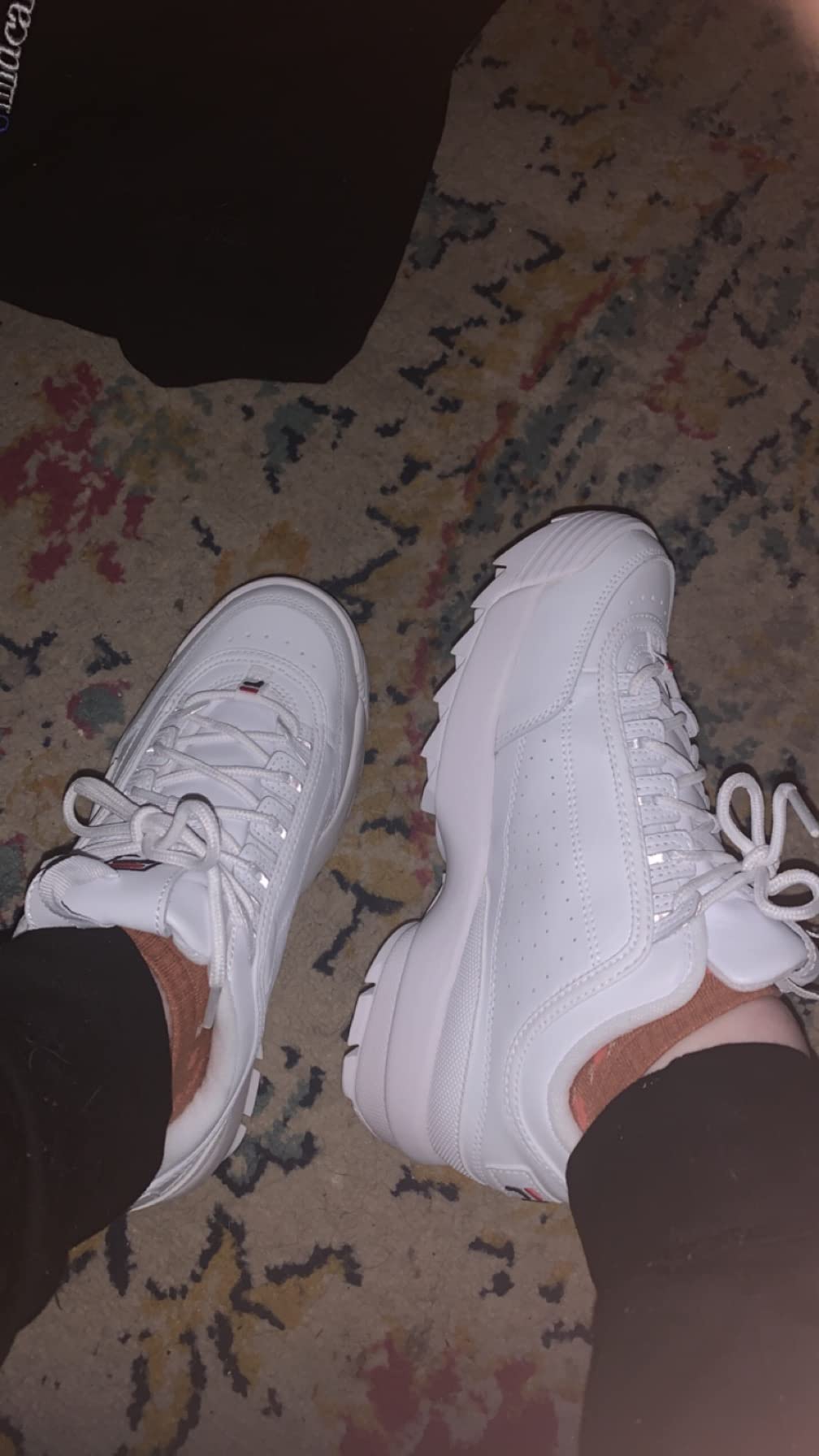 On-foot shot showing Fila Disruptor II fit and styling with casual outfit
