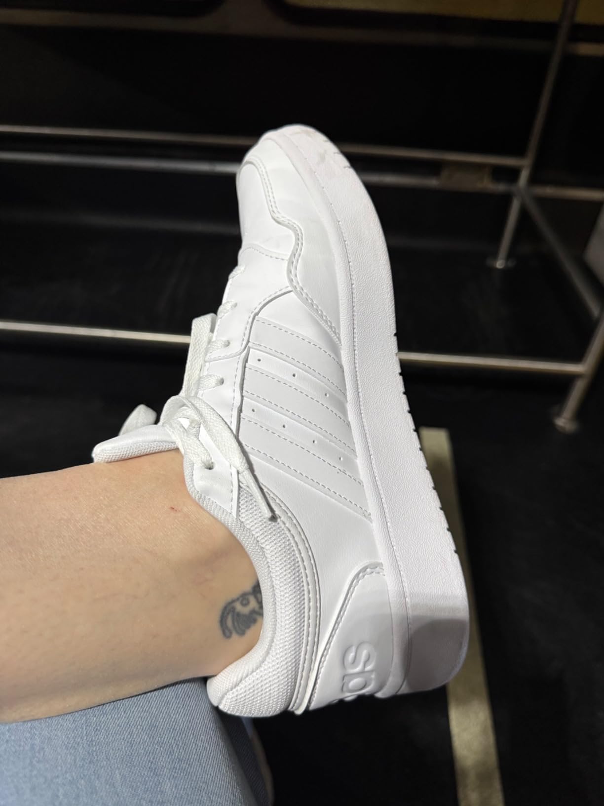 Adidas Hoops 3.0 basketball shoe showing lacing system and tongue construction details