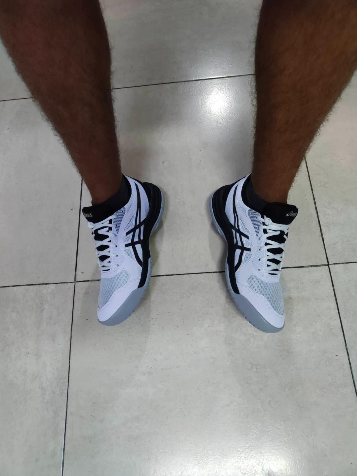 ASICS Upcourt 5 heel view showing ankle support and counter construction