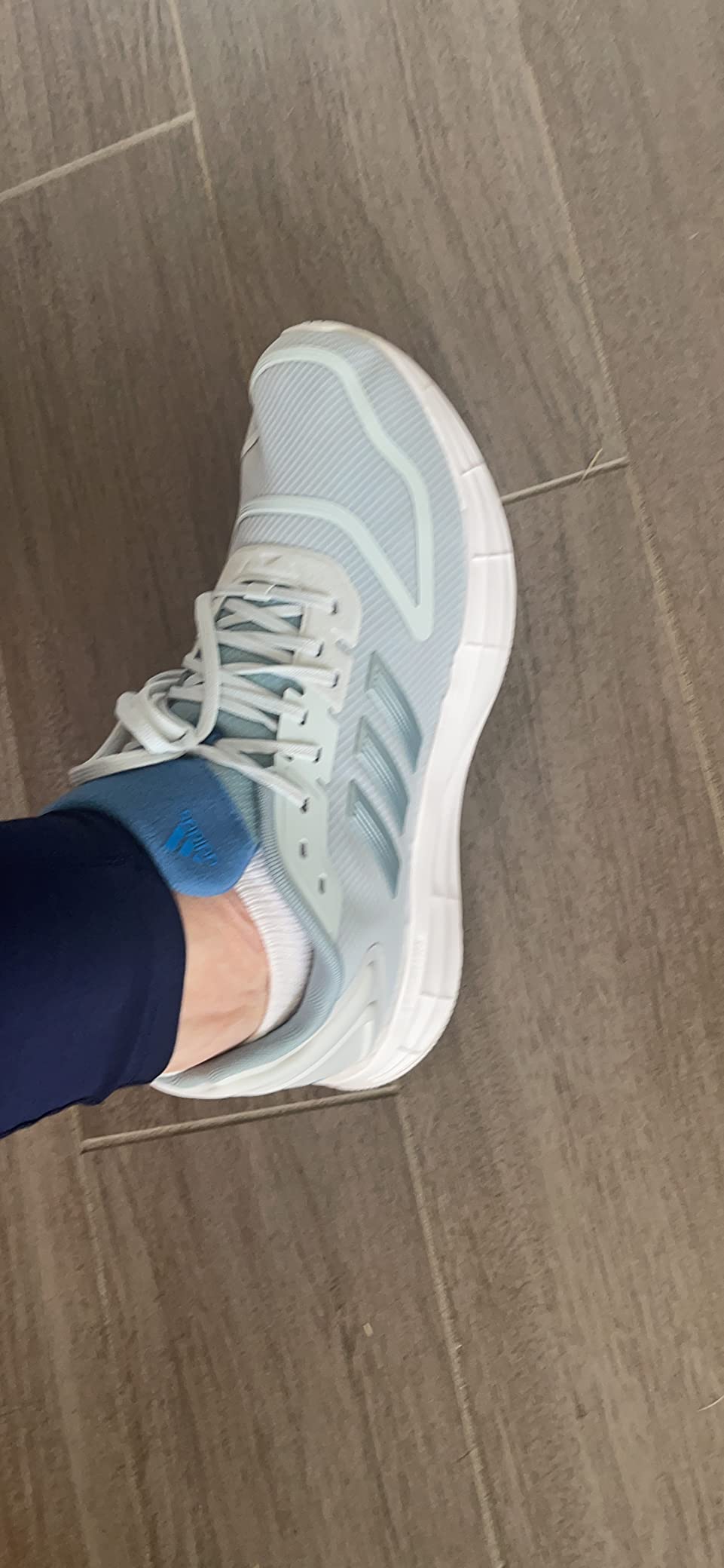 Comparison view showing Adidas Duramo SL 2.0 design details and construction quality at budget price point