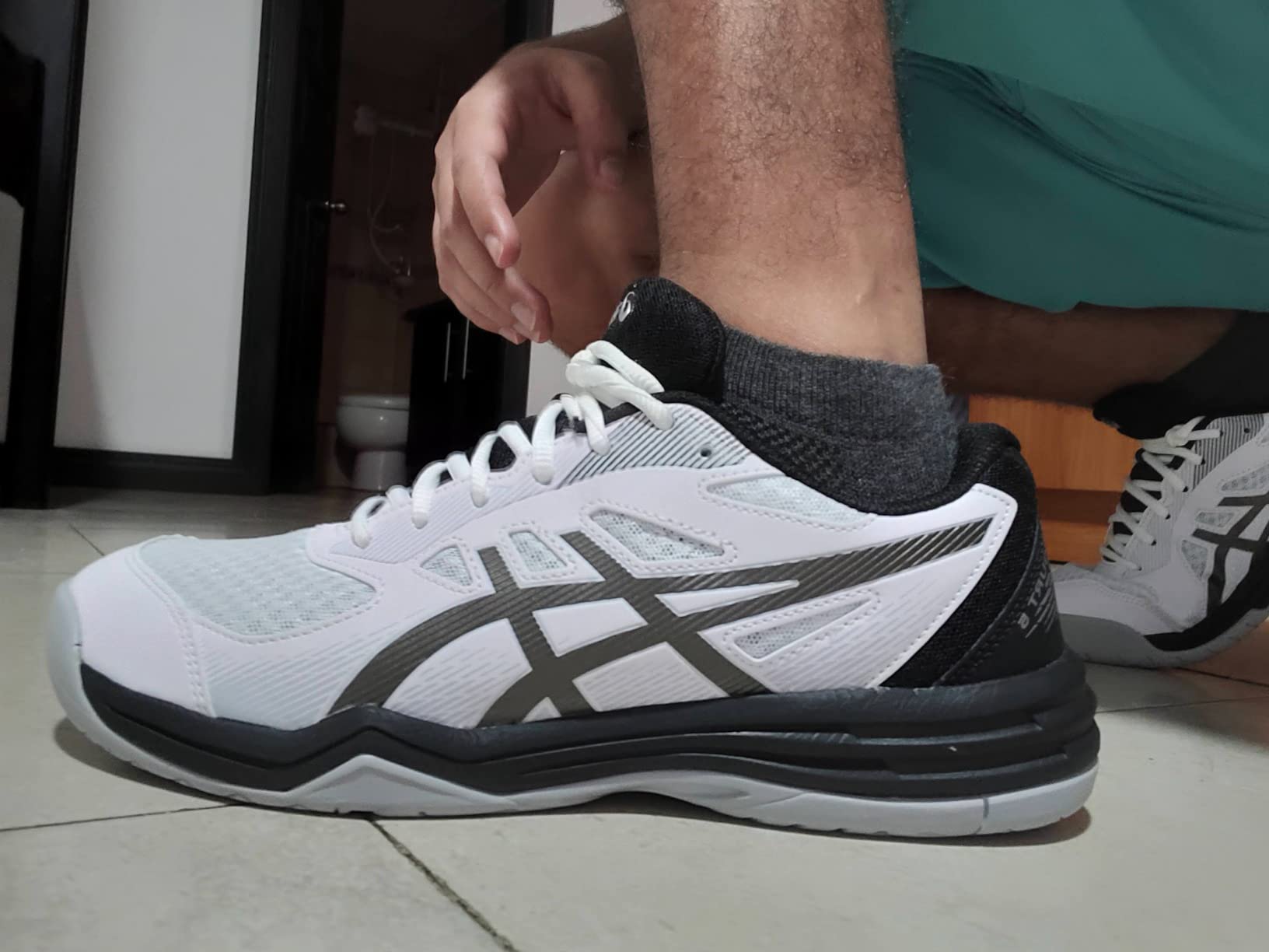 ASICS Upcourt 5 toe box and forefoot construction showing mesh breathability features