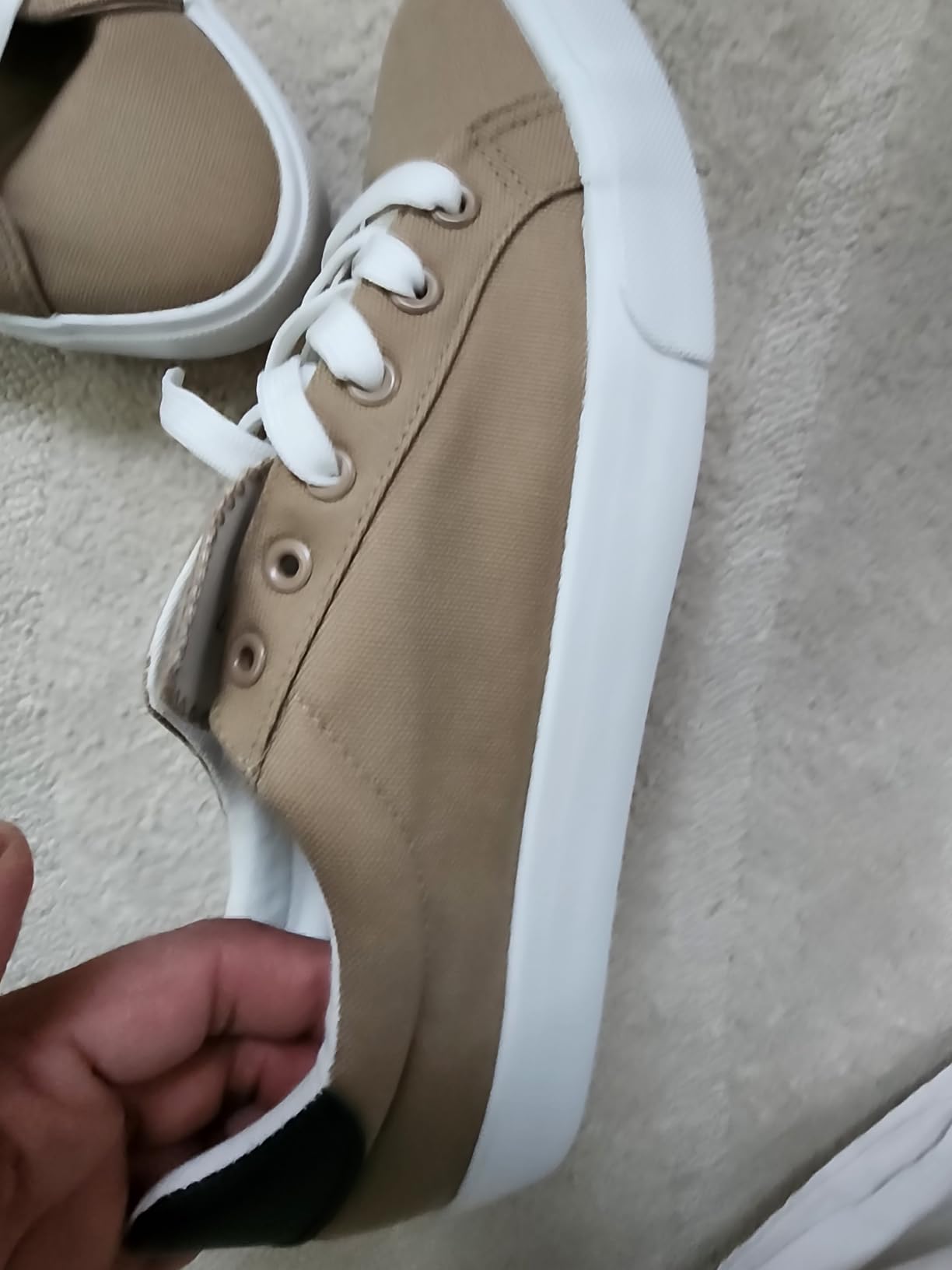 FRACORA mens white canvas shoes showing classic low-top design and lace-up construction