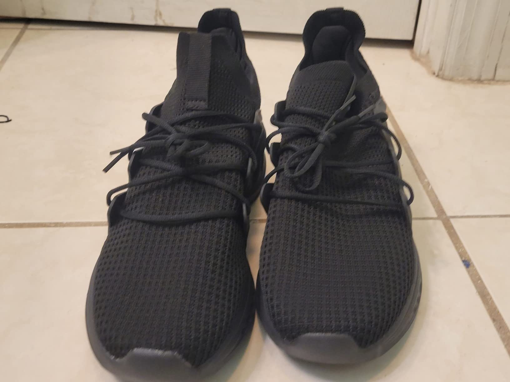 Bottom sole view showing EVA cushioning and non-slip rubber tread pattern design