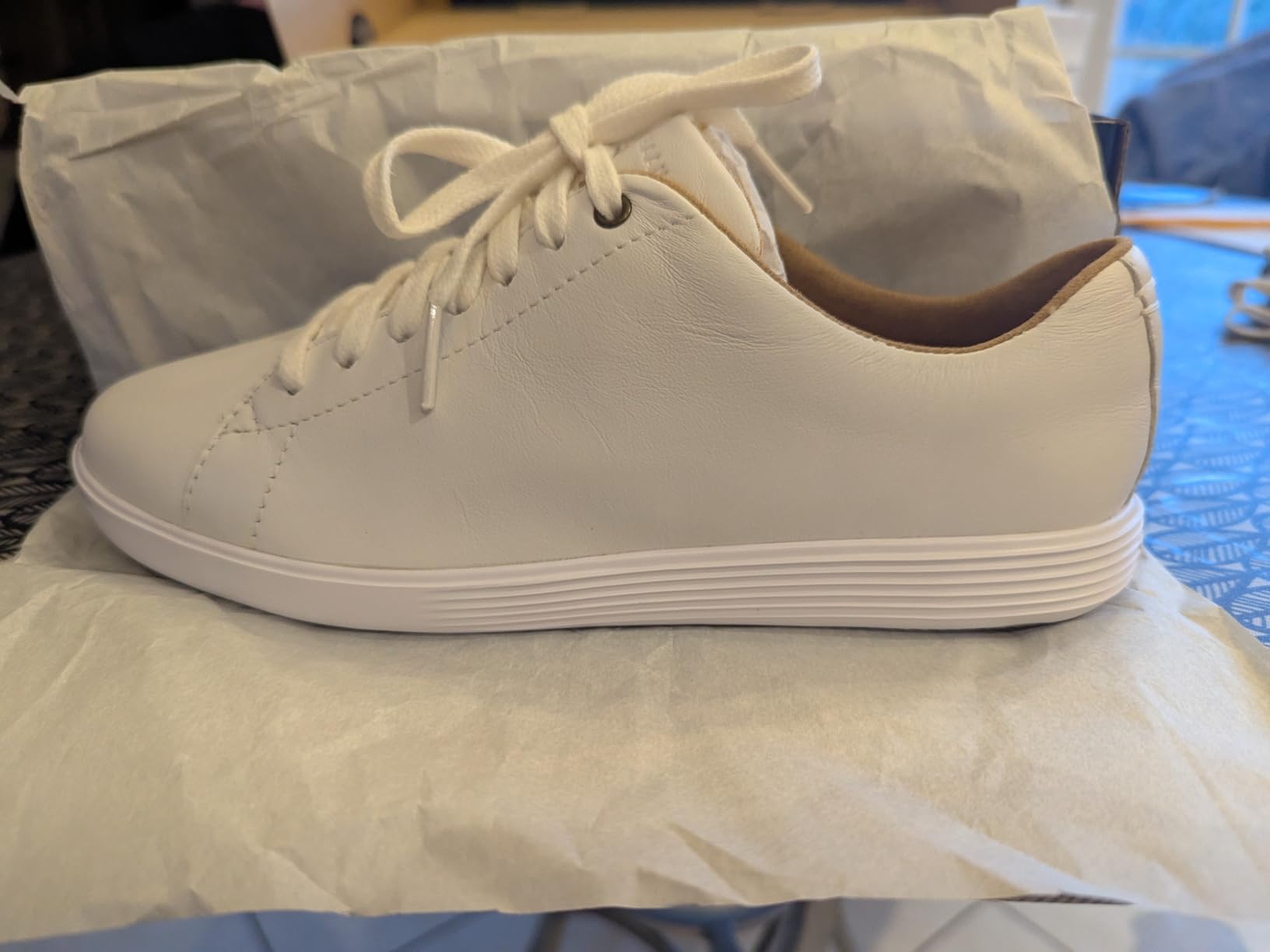 Close-up of Cole Haan sneaker sole showing EVA construction and rubber traction pods