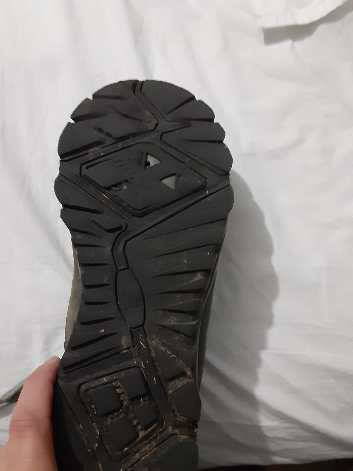 Camel Crown hiking shoes on rocky trail terrain showing traction performance