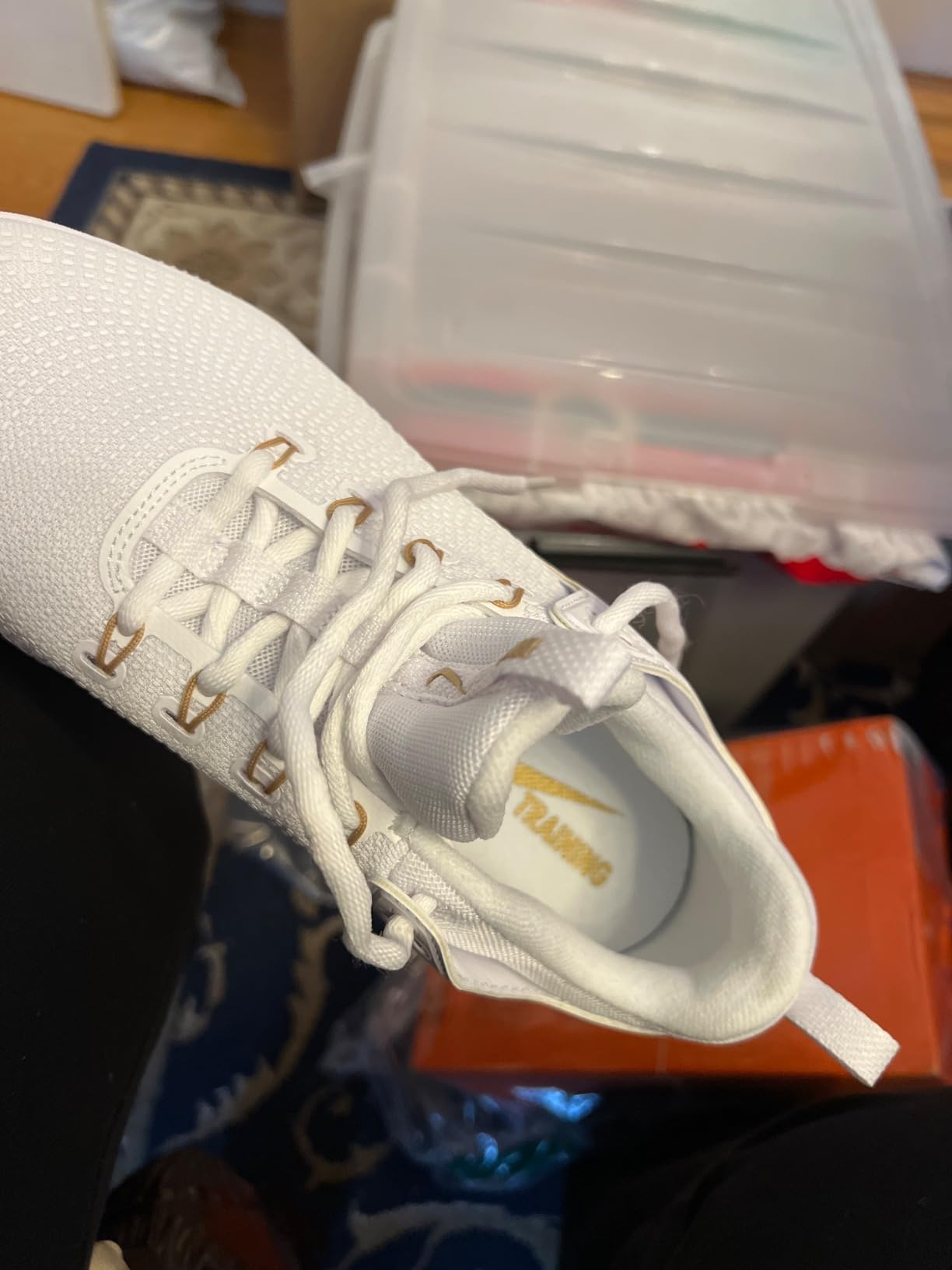 Nike volleyball shoes in original packaging showing quality control and presentation