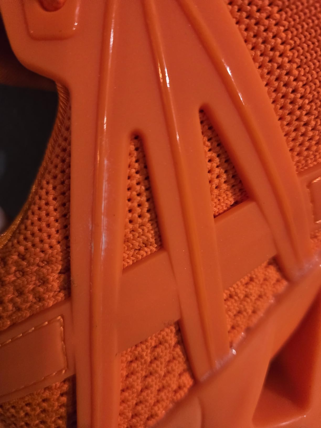 Side profile view of FRSHANIAH athletic shoes showing slip-on design and heel construction