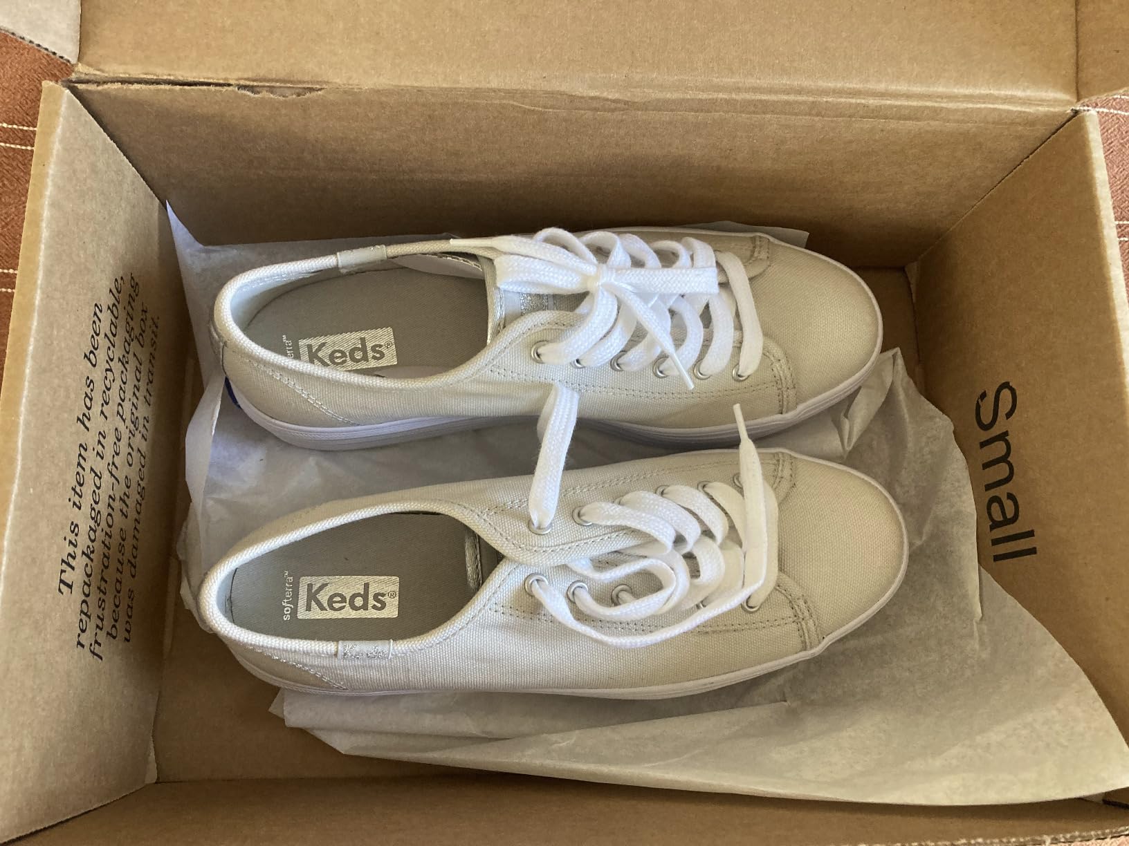 Keds Women's Triple Up white leather platform sneakers showing classic design and 1.5 inch platform sole