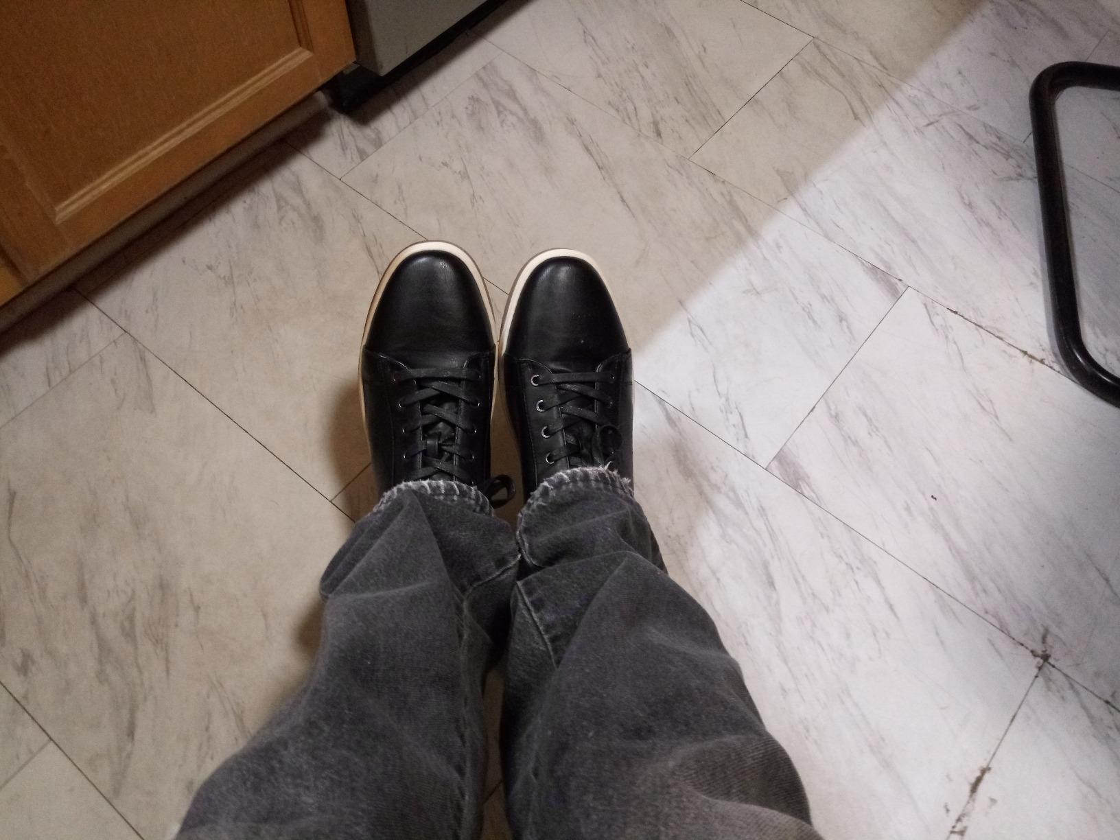 Final assessment photo of Vostey men's sneakers after 8 weeks testing showing overall condition