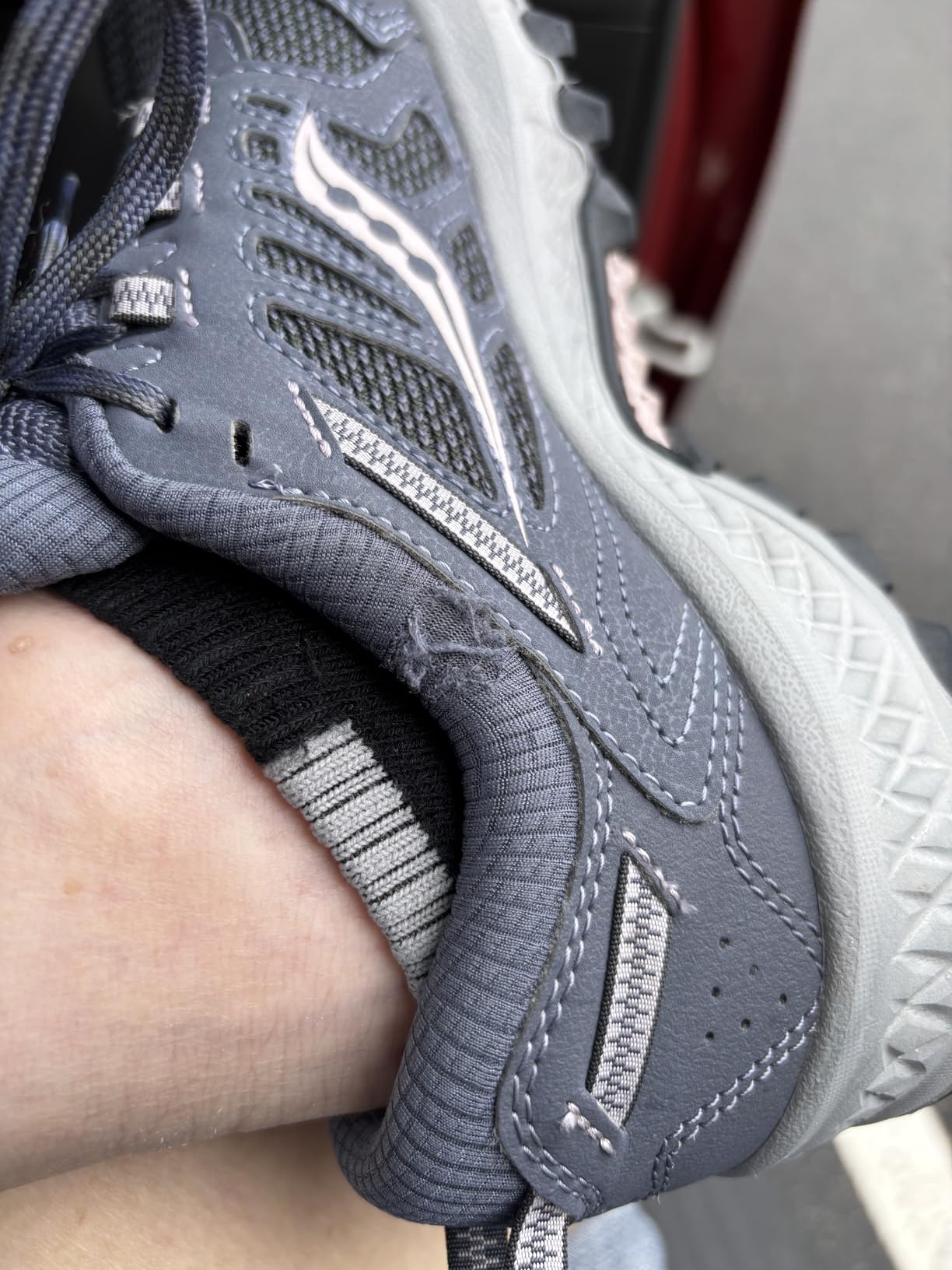 Comparison image showing Saucony TR13 durability issues with fabric tearing