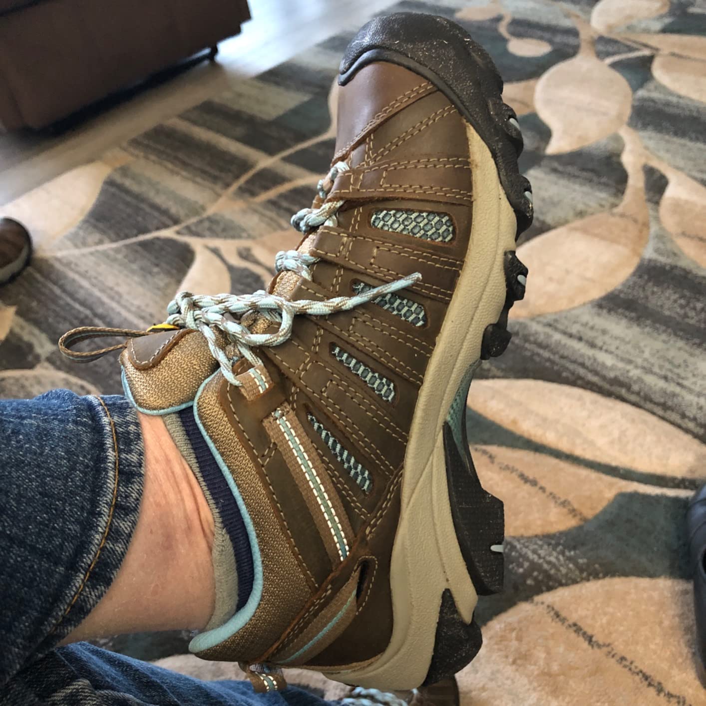 KEEN Voyageur detail shot showing lacing system and heel capture technology for secure fit