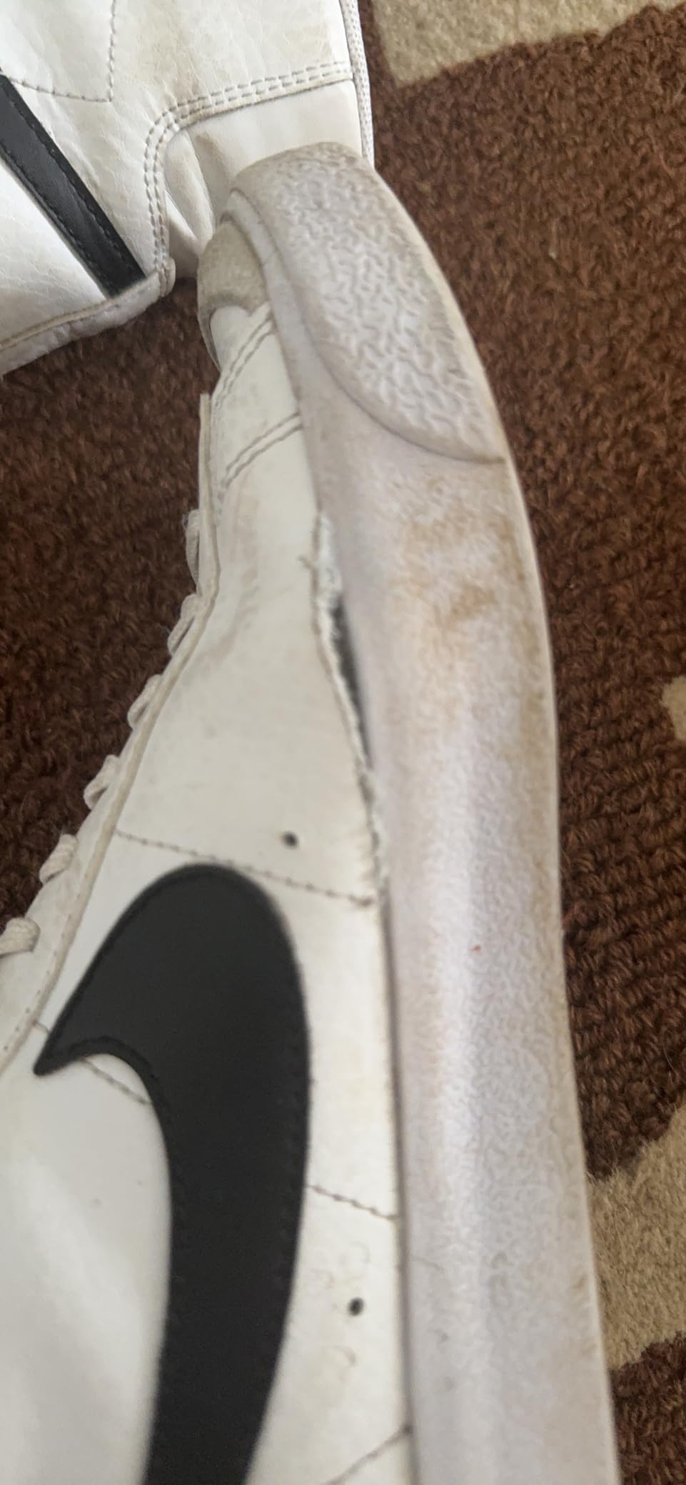 Nike Kids Blazer Mid 77 showing wear and durability after extended use with some minor scuffing