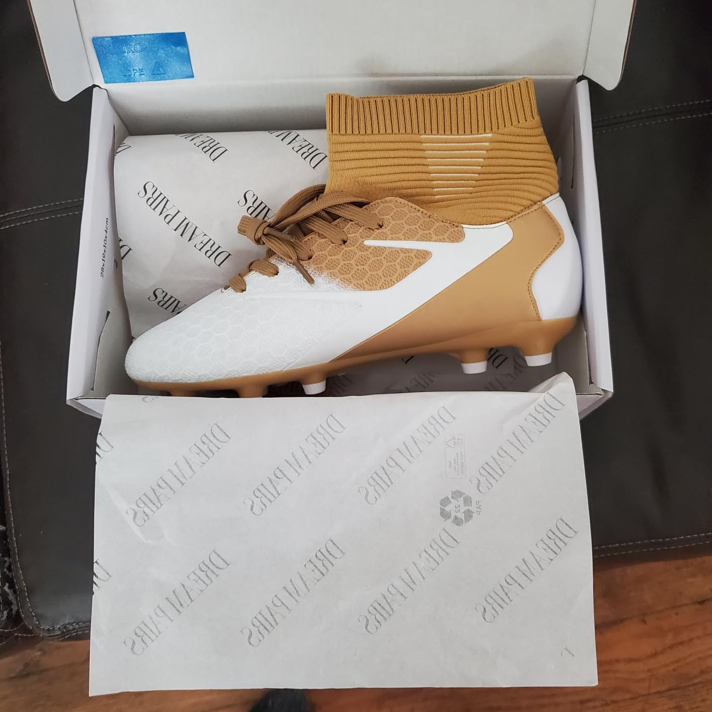 DREAM PAIRS cleats being tested on different field surfaces showing versatility