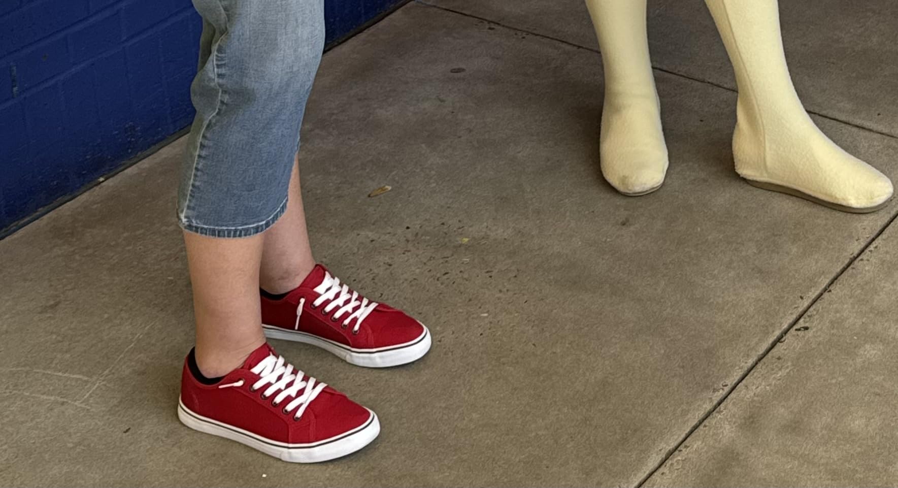 Side view of XRH canvas sneakers showing profile and sole construction