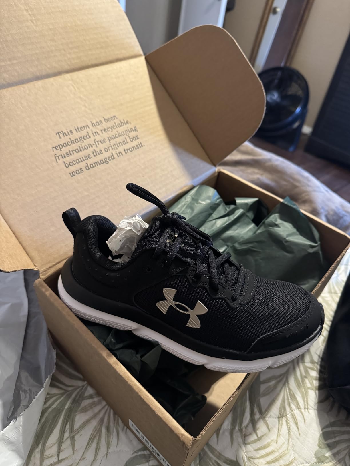 Under Armour Assert 10 sole pattern showing rubber outsole with traction design