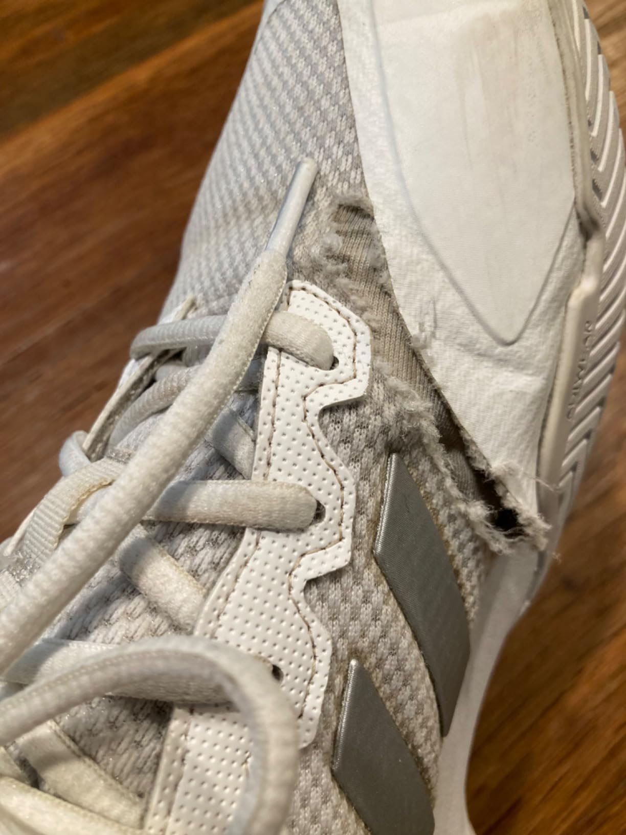 Adidas Gamecourt 2 after 8 months of use showing tread wear and side seam issues