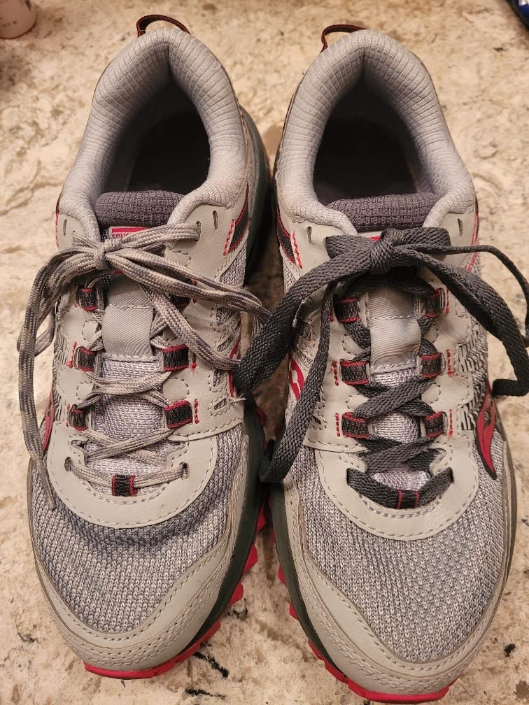 Close-up view of Saucony TR13 mesh upper construction showing supportive overlays and lacing system