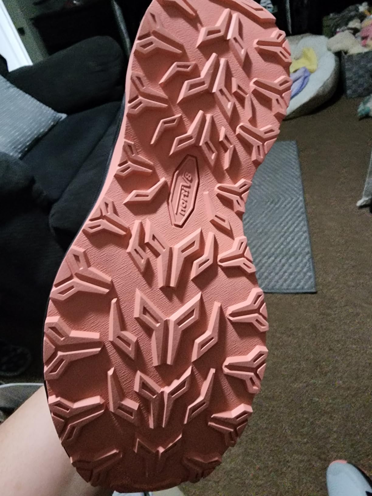 Bottom sole view showing textured rubber traction pattern on NORTIV 8 hiking shoes