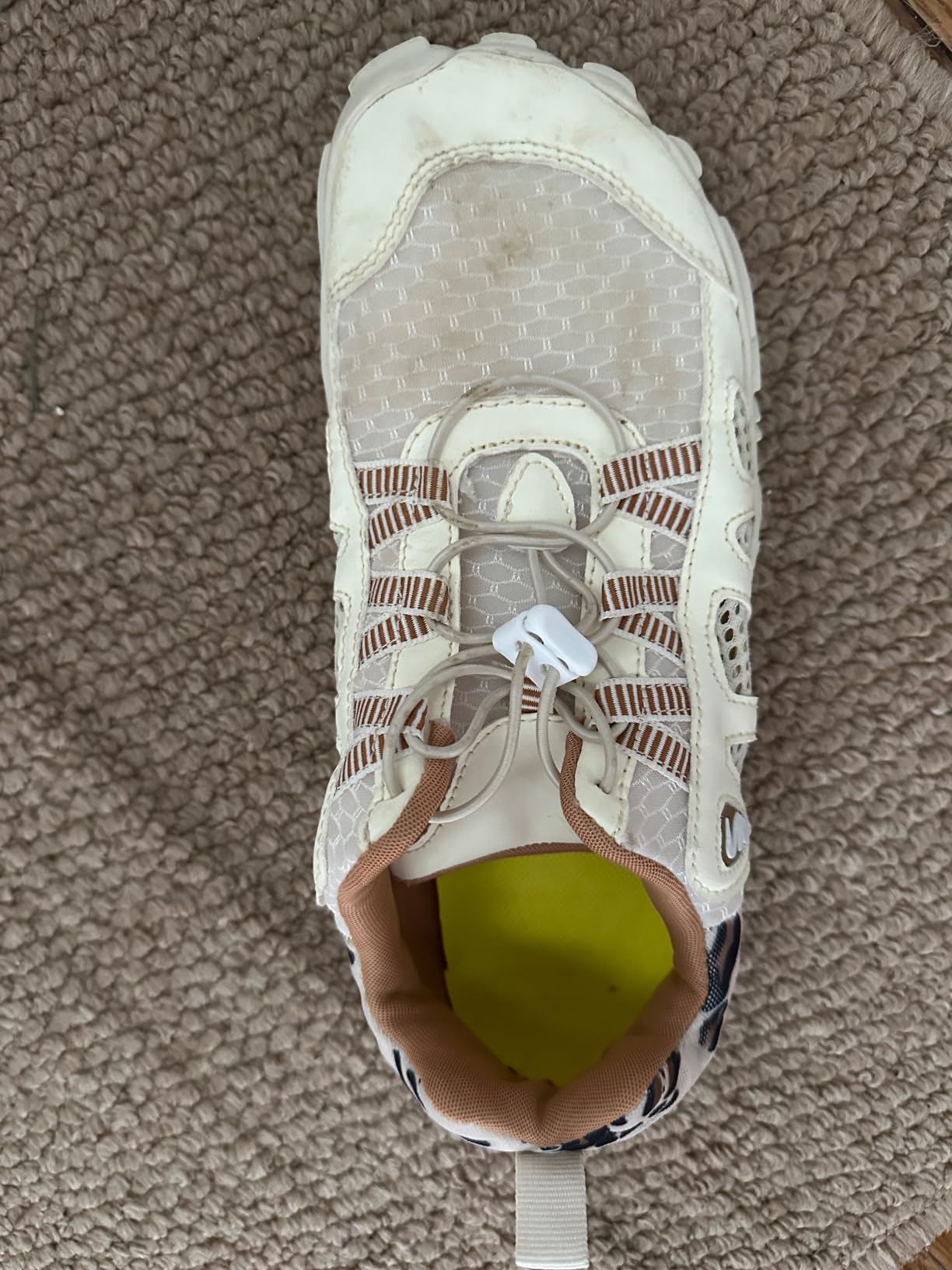 User wearing XIHALOOK water shoes after extensive testing showing wear and durability