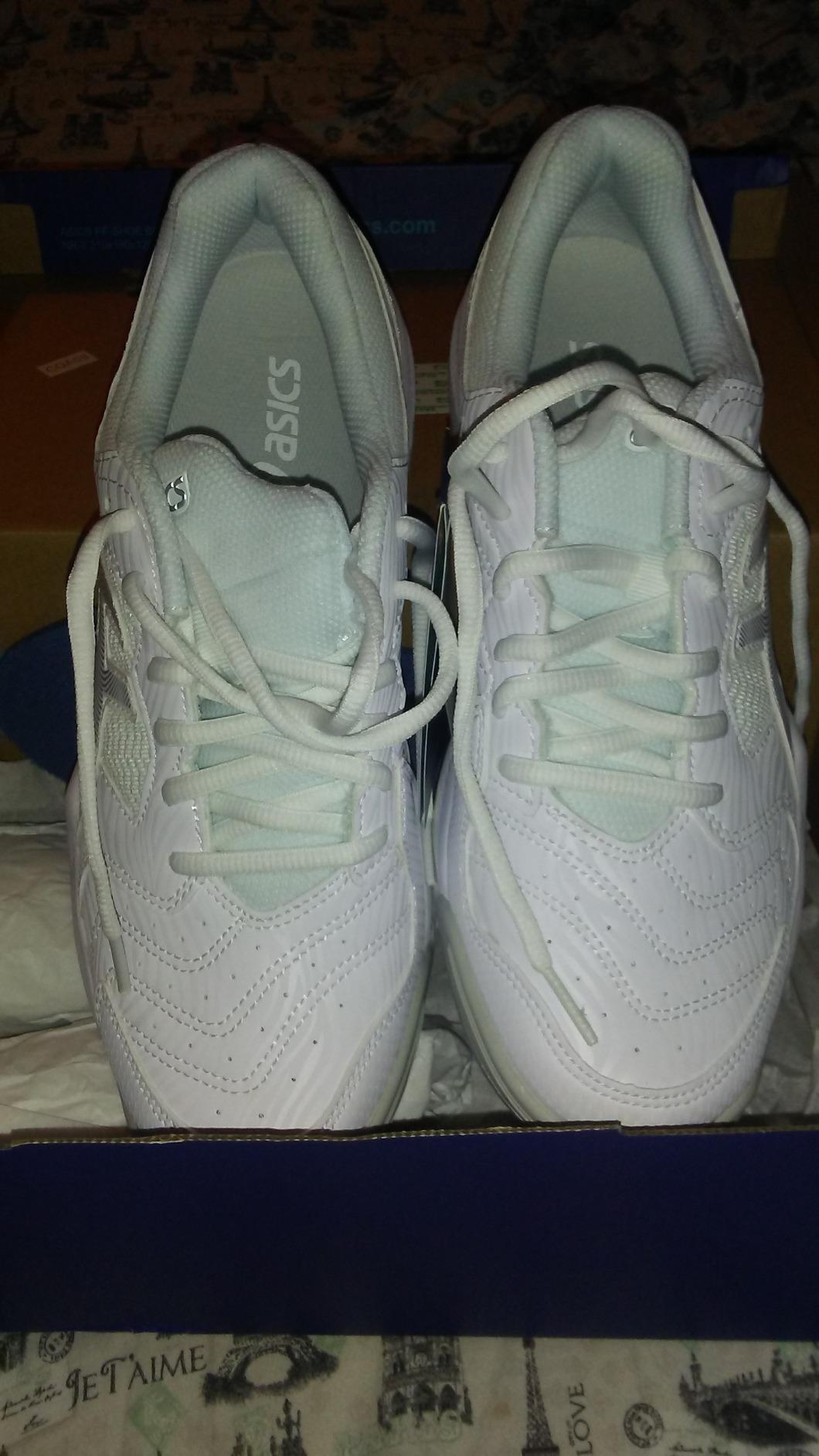 ASICS tennis shoes showing fit on foot demonstrating narrow toe box and overall sizing characteristics