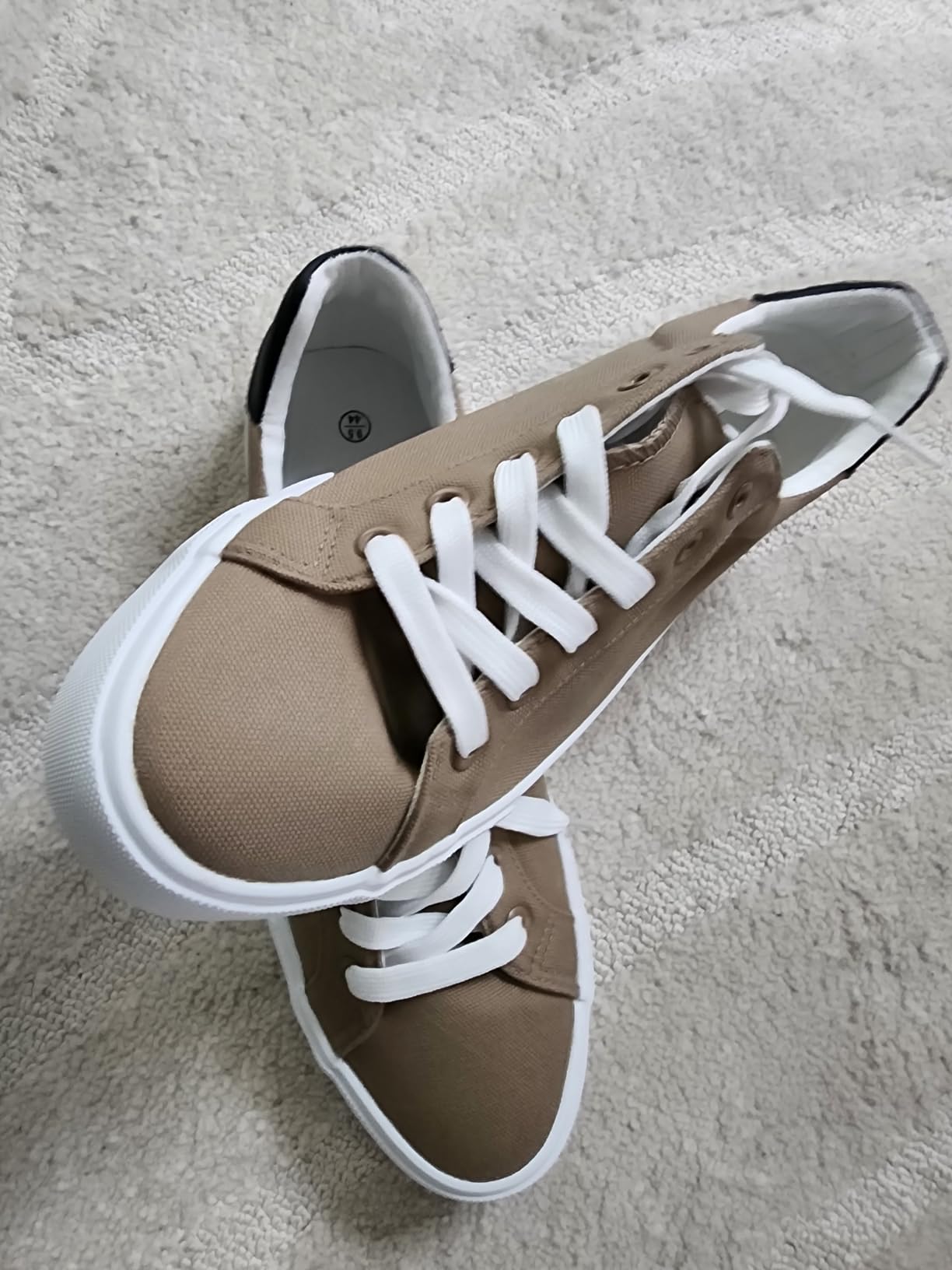 FRACORA canvas sneakers detailed view showing canvas upper construction and rubber sole