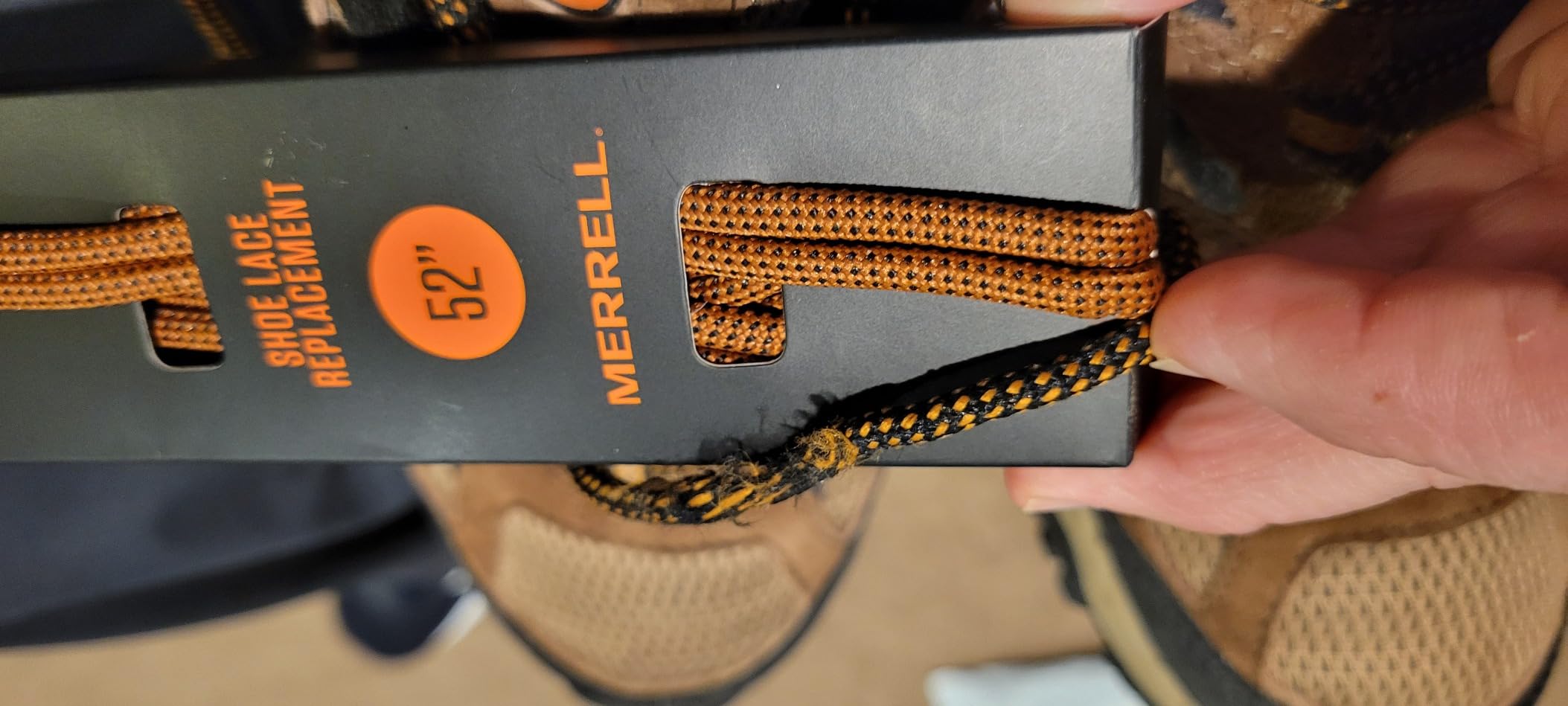 Merrell Moab 3 hiking shoes in action on rocky desert trail showing real-world durability and traction performance