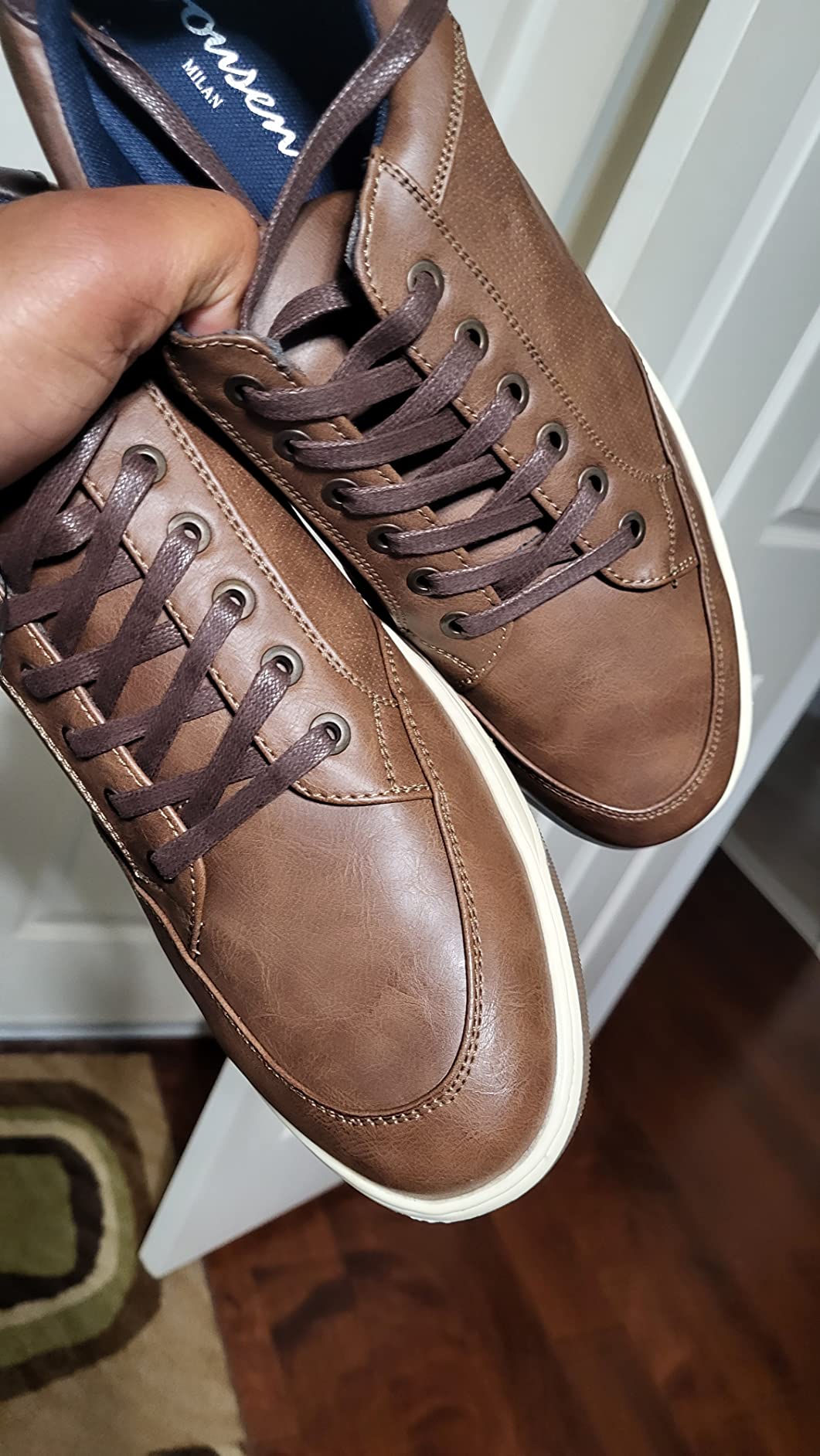 Example of typical sole separation problem showing detached rubber sole and exposed adhesive