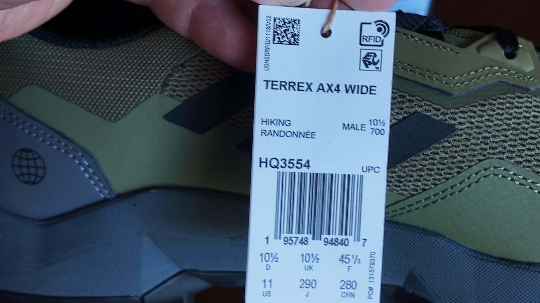 Close-up of Adidas Terrex AX4 mesh upper construction showing breathable panels and synthetic reinforcements