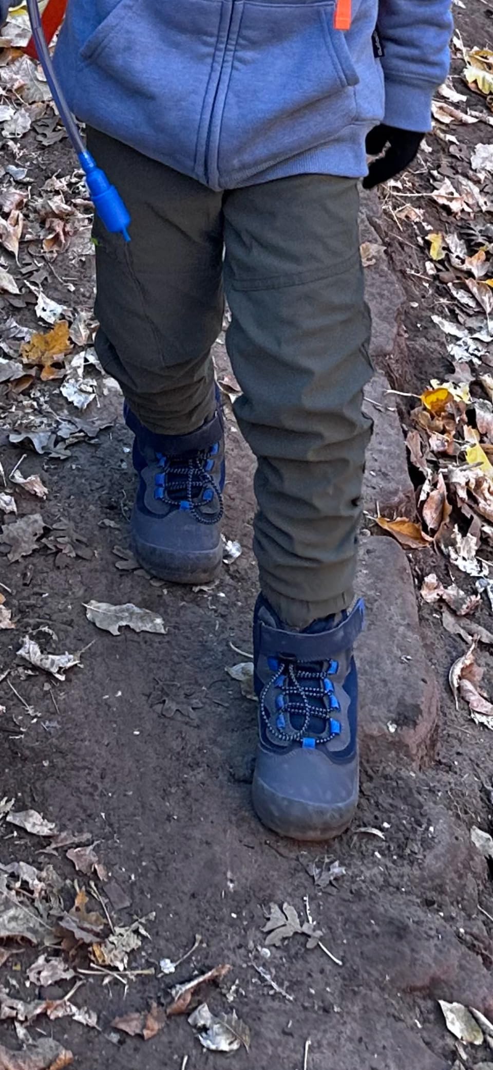 Bottom view of Mishansha kids hiking boots showing rubber tread pattern and anti-slip design for outdoor activities