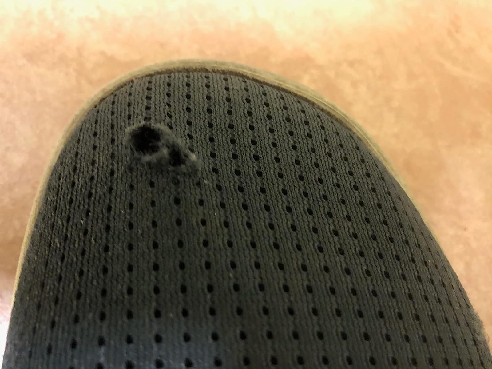 OLUKAI Nohea Moku showing durability concerns with toe area wear after extensive daily use