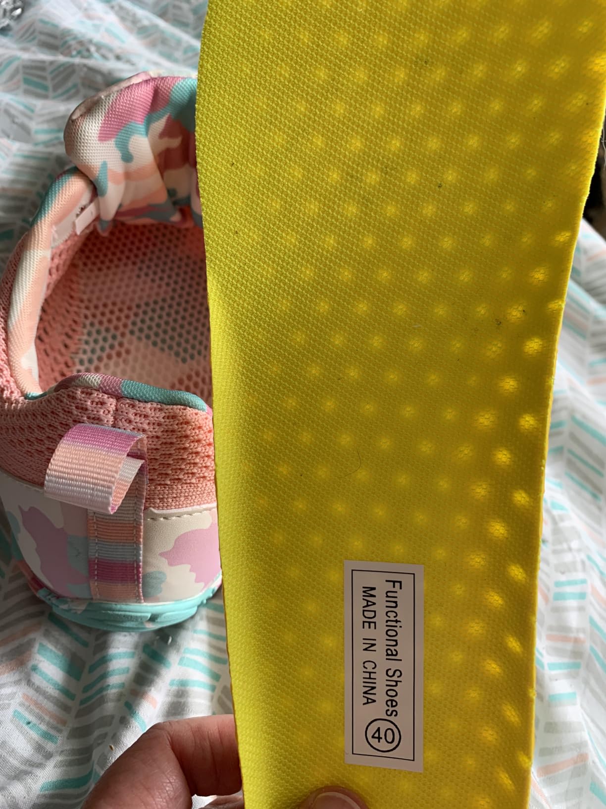 Detailed view of Scurtain water shoes construction showing mesh upper and rubber sole integration