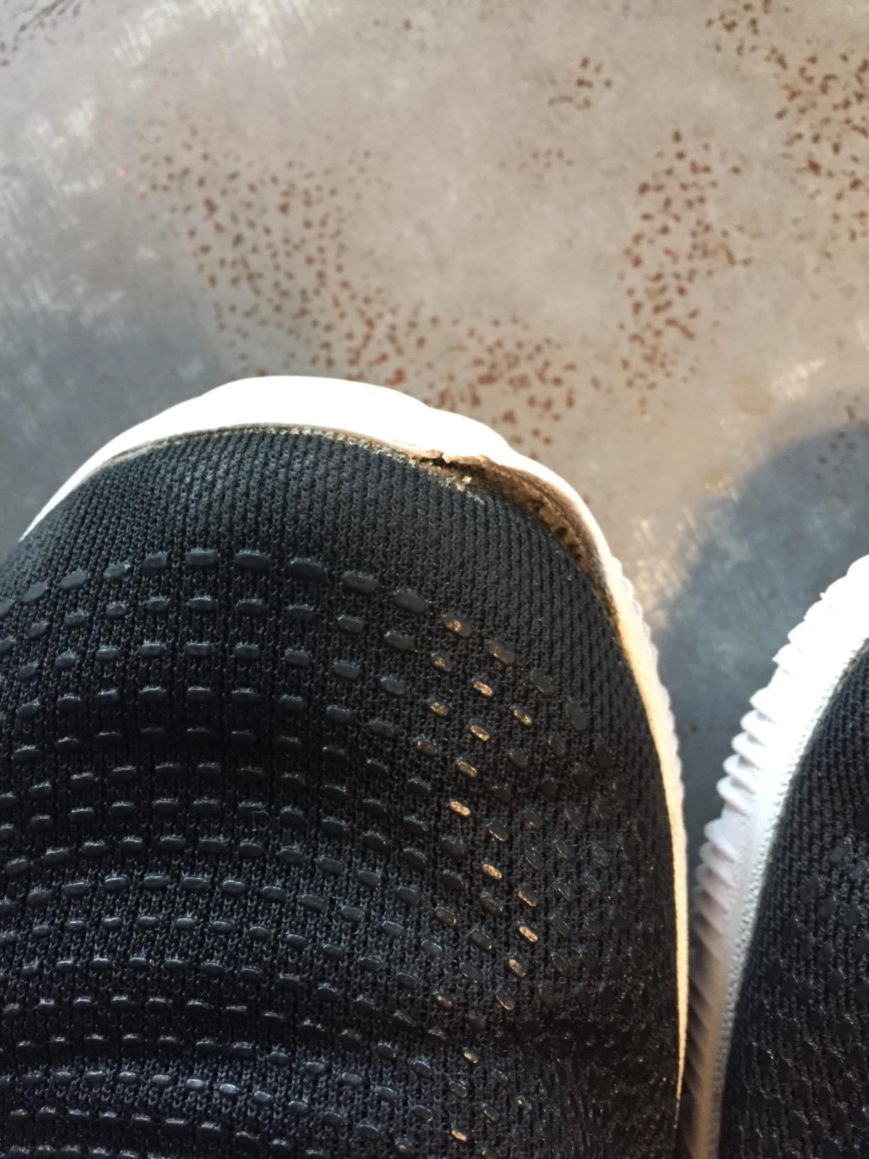 Nike Zoom HyperAce 2 side profile showing TPU cage support system and mid-top ankle design