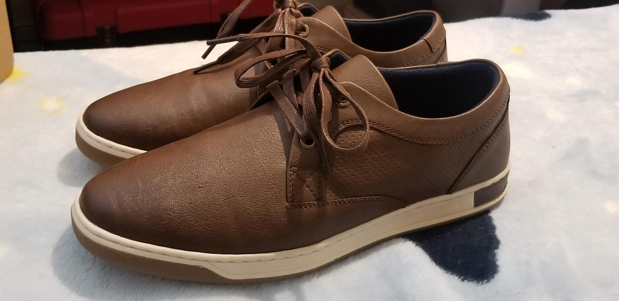 Vostey Men's Sneakers yellow brown casual dress shoes showing oxford-style design and lace-up closure