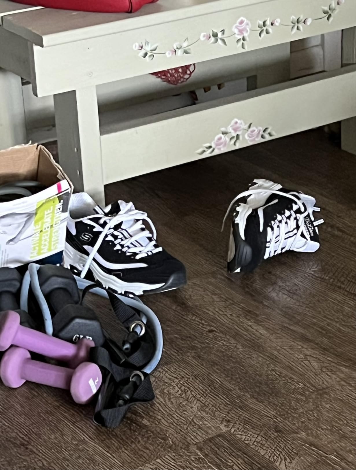 Skechers D'Lites in lifestyle setting showing the sneakers during daily wear activities