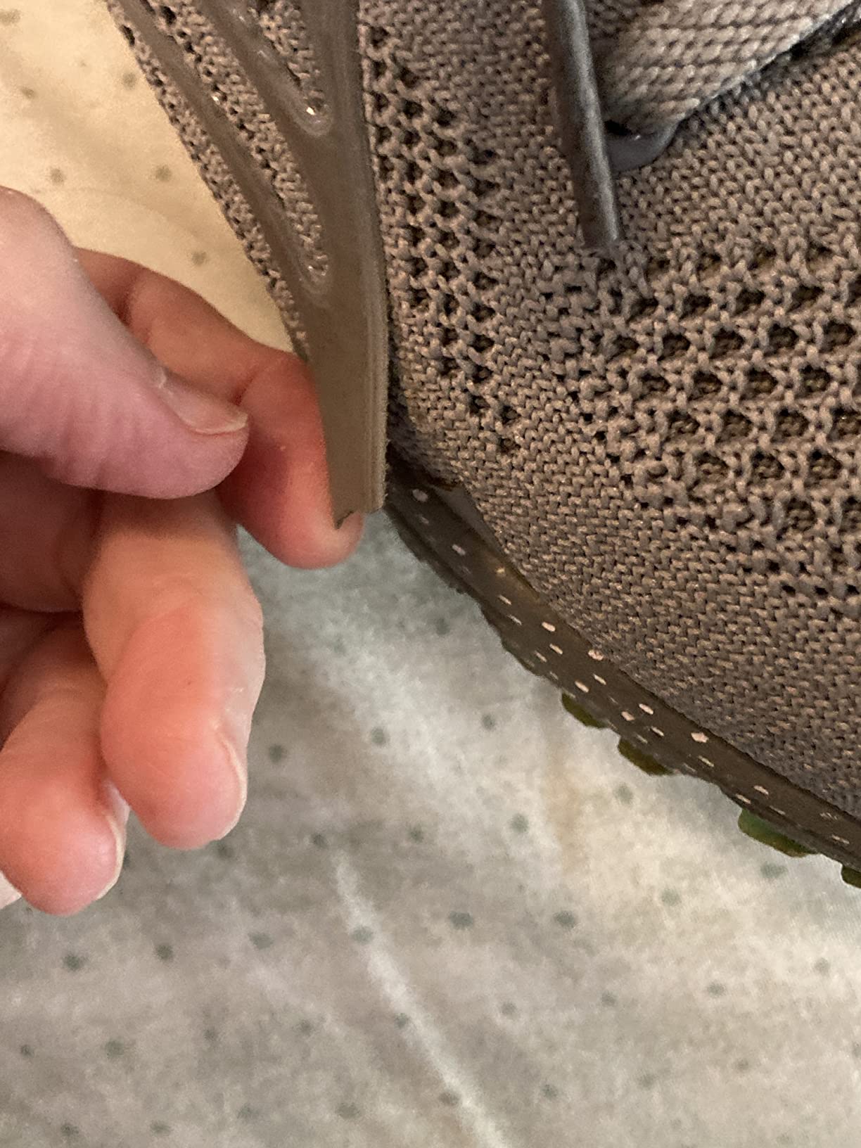 Side profile showing air cushion technology and rubber outsole pattern for traction