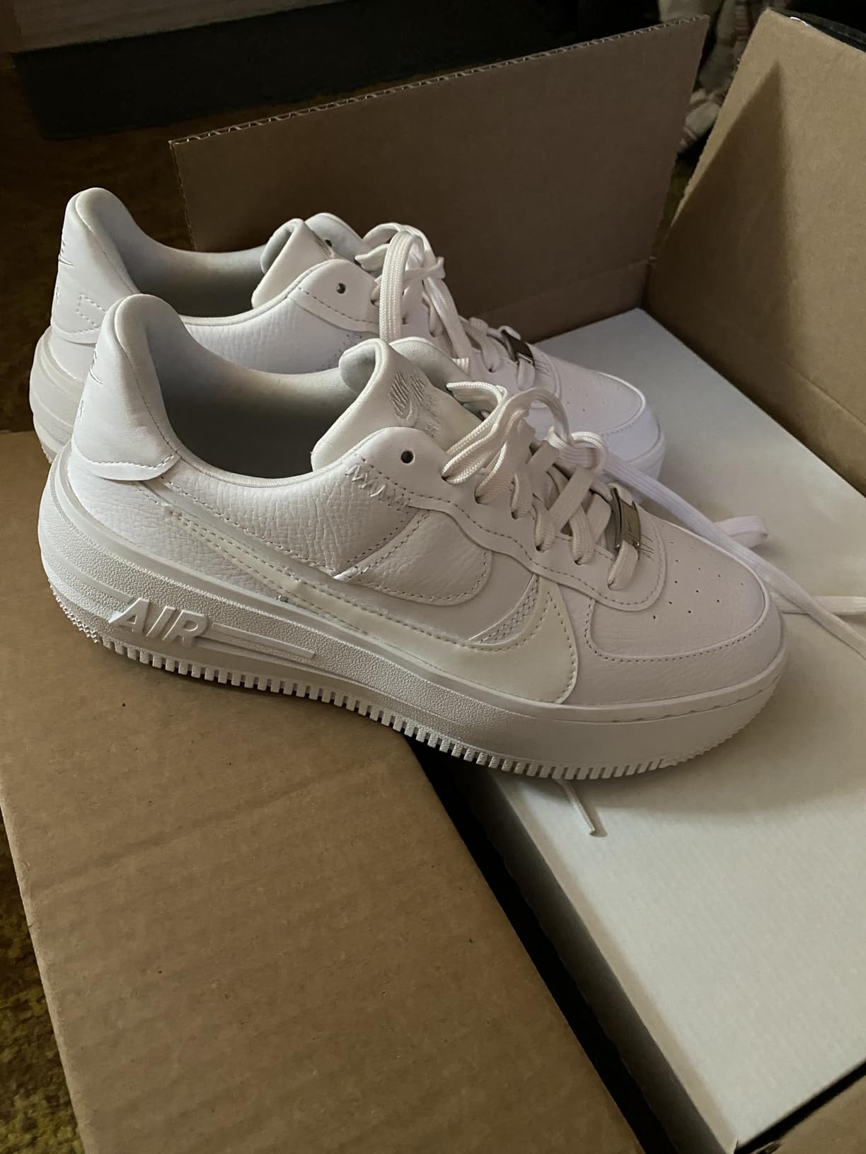 Nike Air Force 1 women's sneaker showing different color variations and styling options