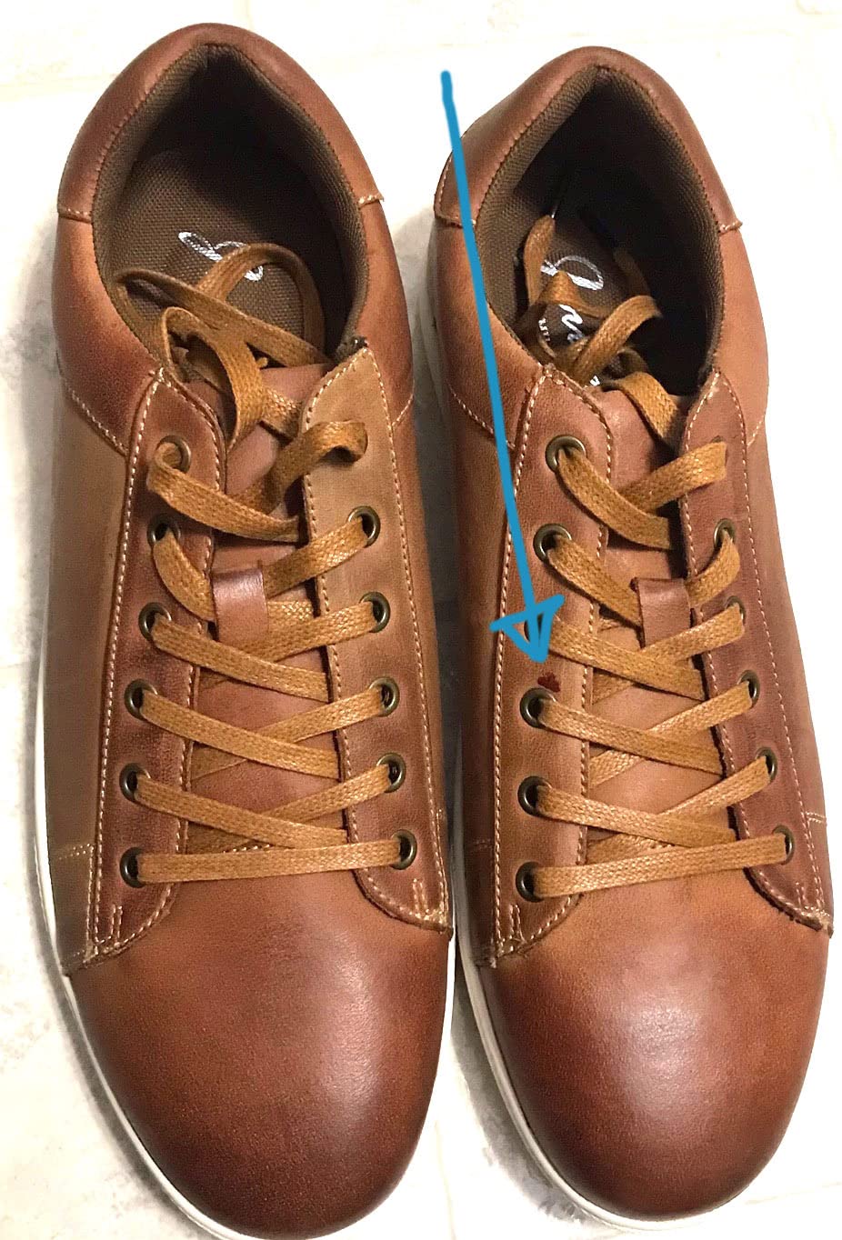 Jousen leather sneakers interior showing removable insole and breathable lining construction