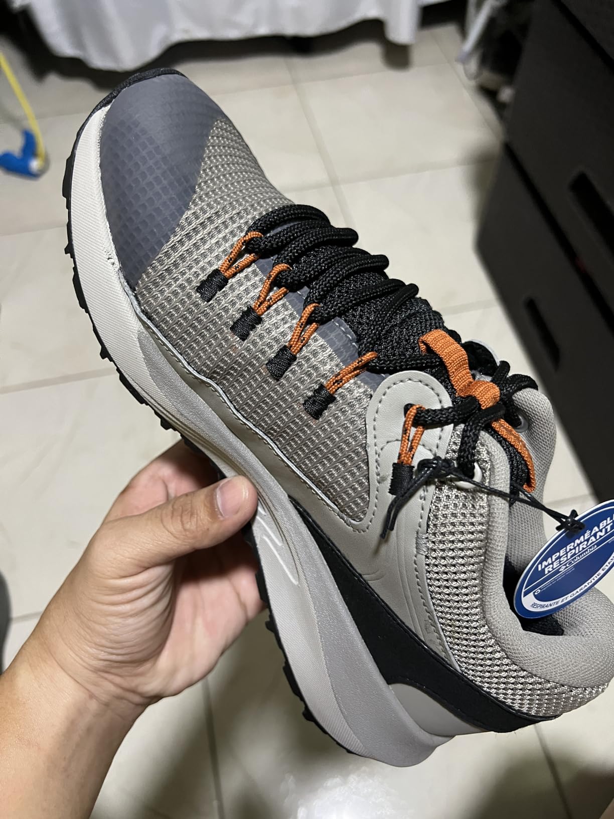 Columbia Trailstorm hiking shoe side profile showing NavicFit lacing system and mesh construction details
